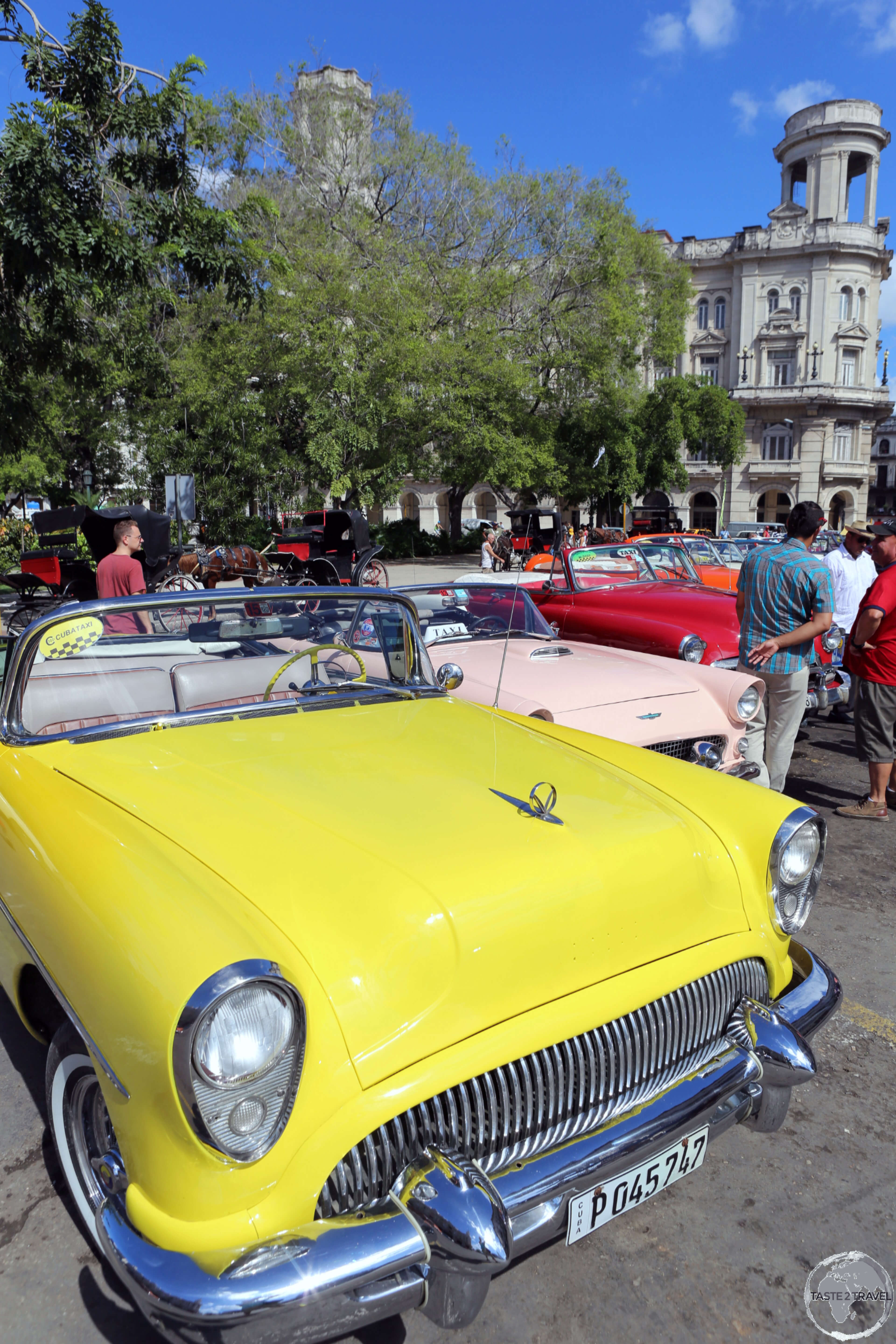 American classic car taxi's available for hire at Parque Central in Havana old town.