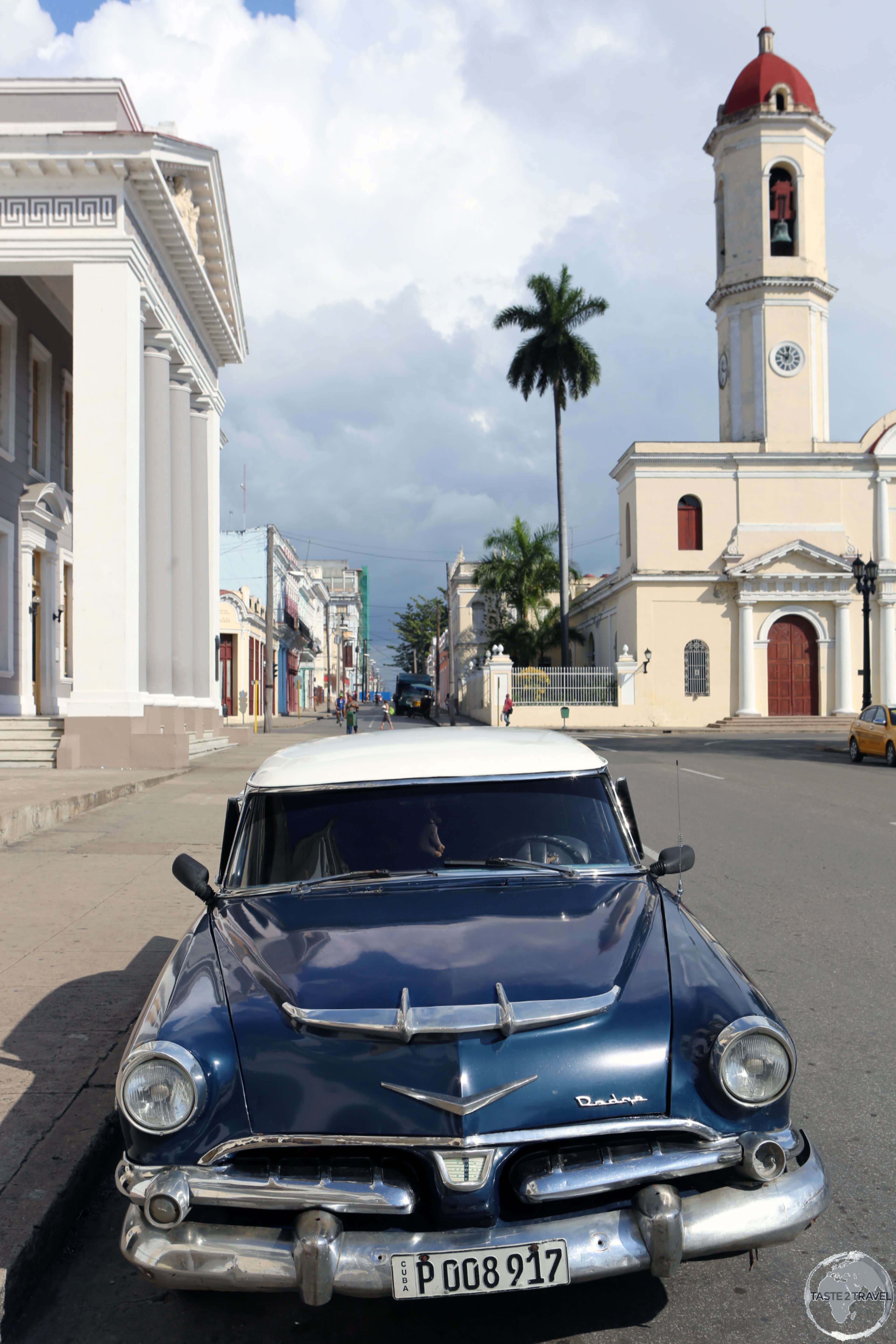 A classic American car parked outside Teatro Terry in downtown Cienfuegos.