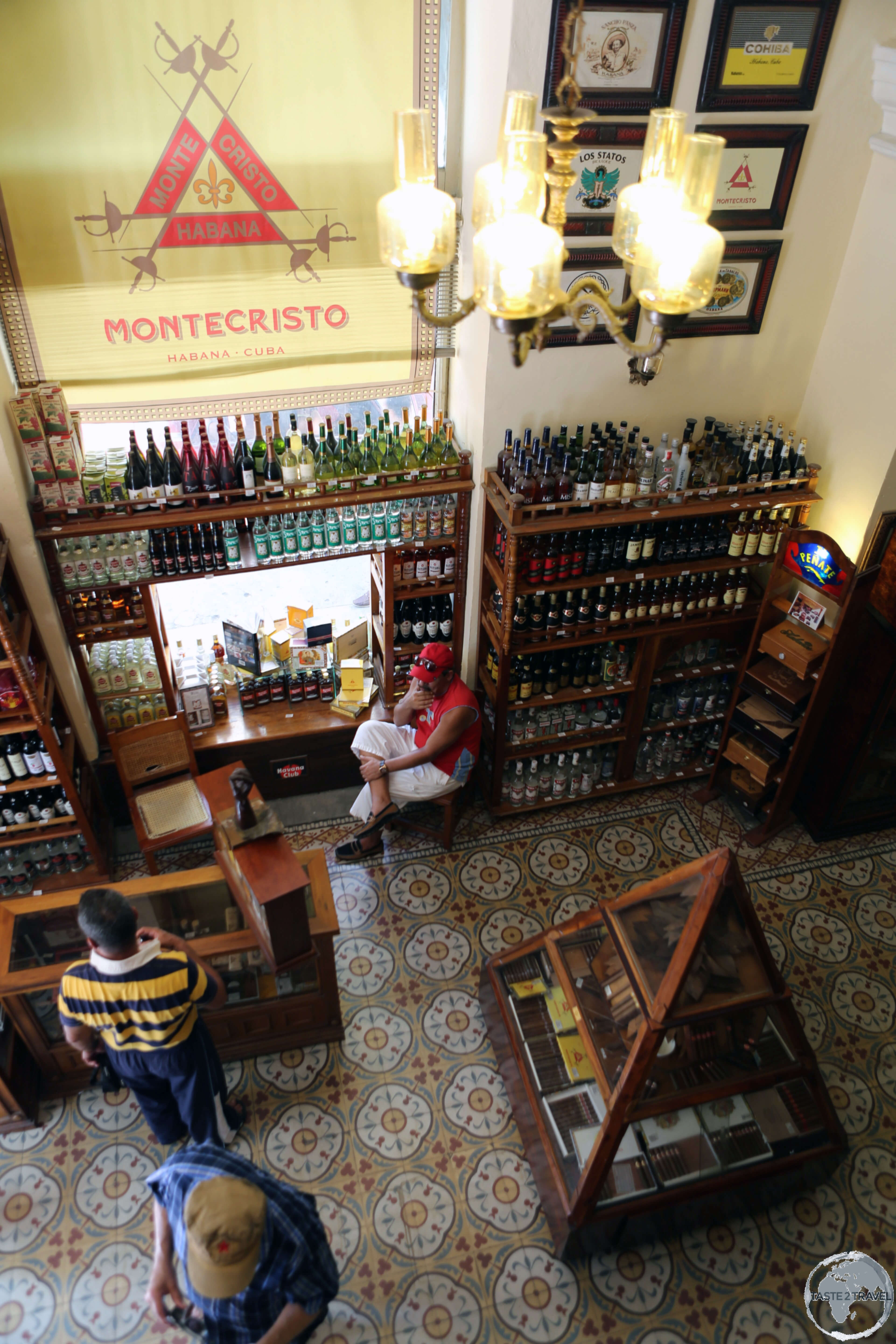 A view of the most amazing rum and cigar emporium - the "Casa del Habano <i>El Embajador</i>" in downtown Cienfuegos. 