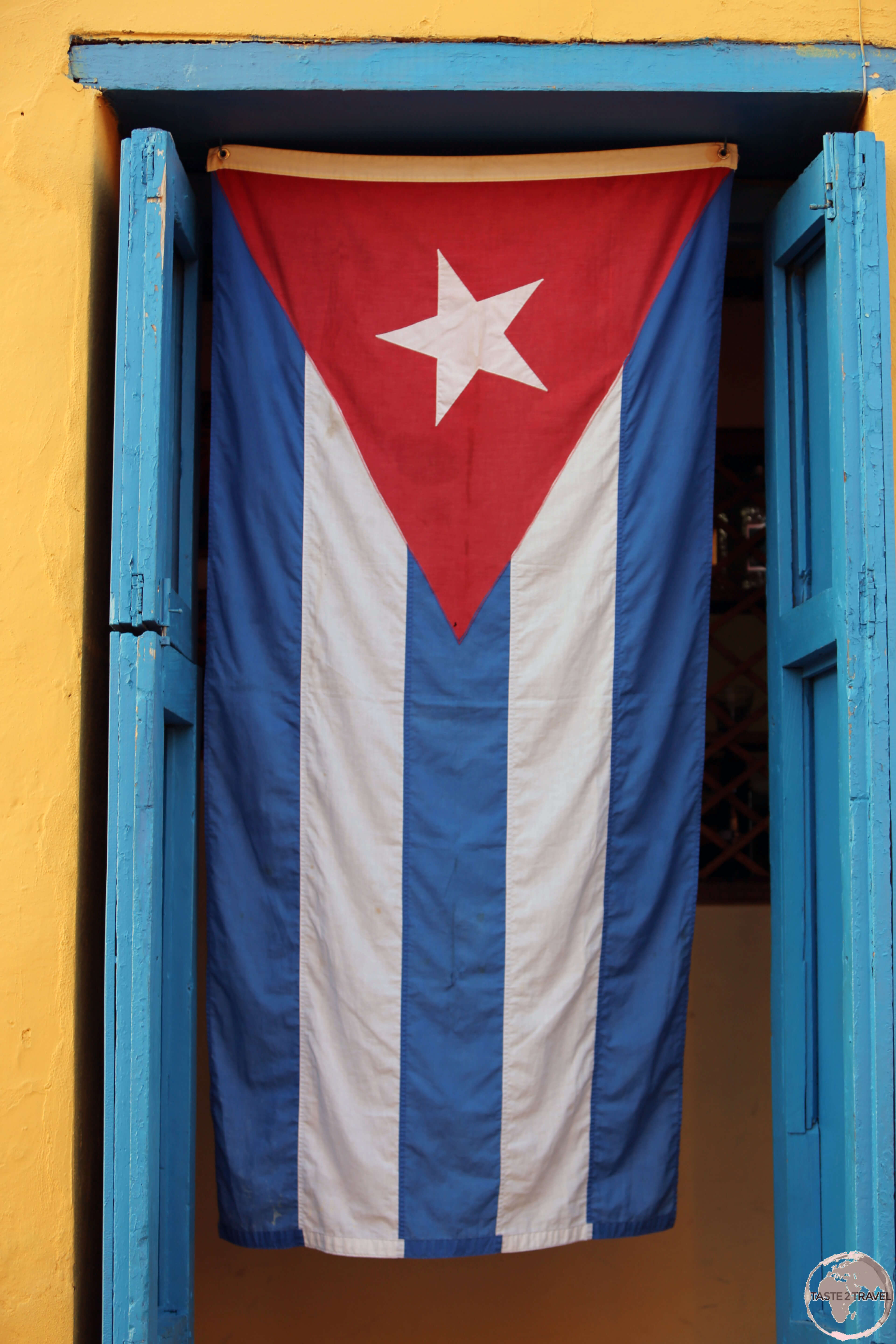 A Cuban flag in Trinidad old town.