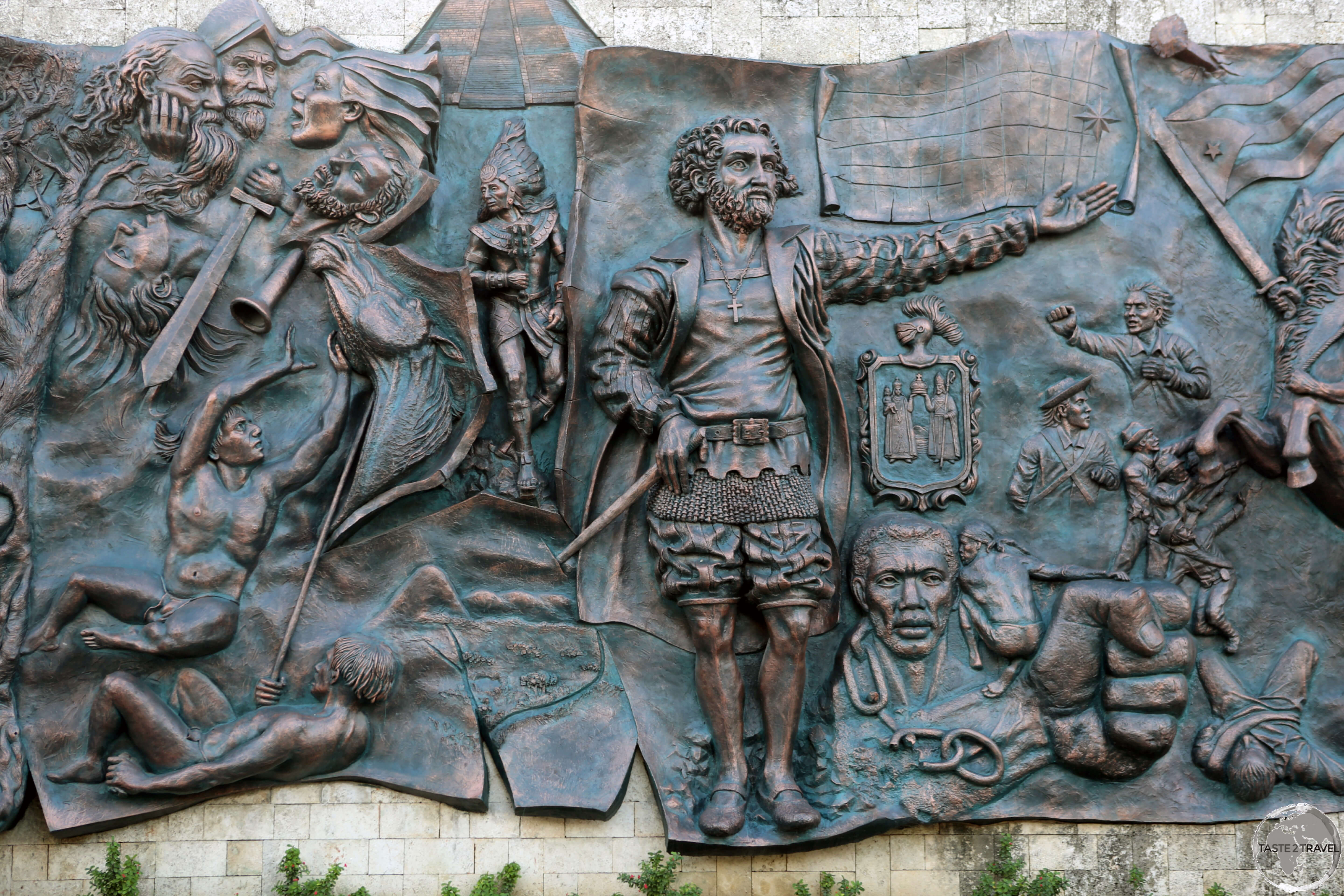 A bronze, bas-relief mural, titled <i>Origenes</i>, is a highlight of the <i>Parque de las Flores</i> in Holguin.