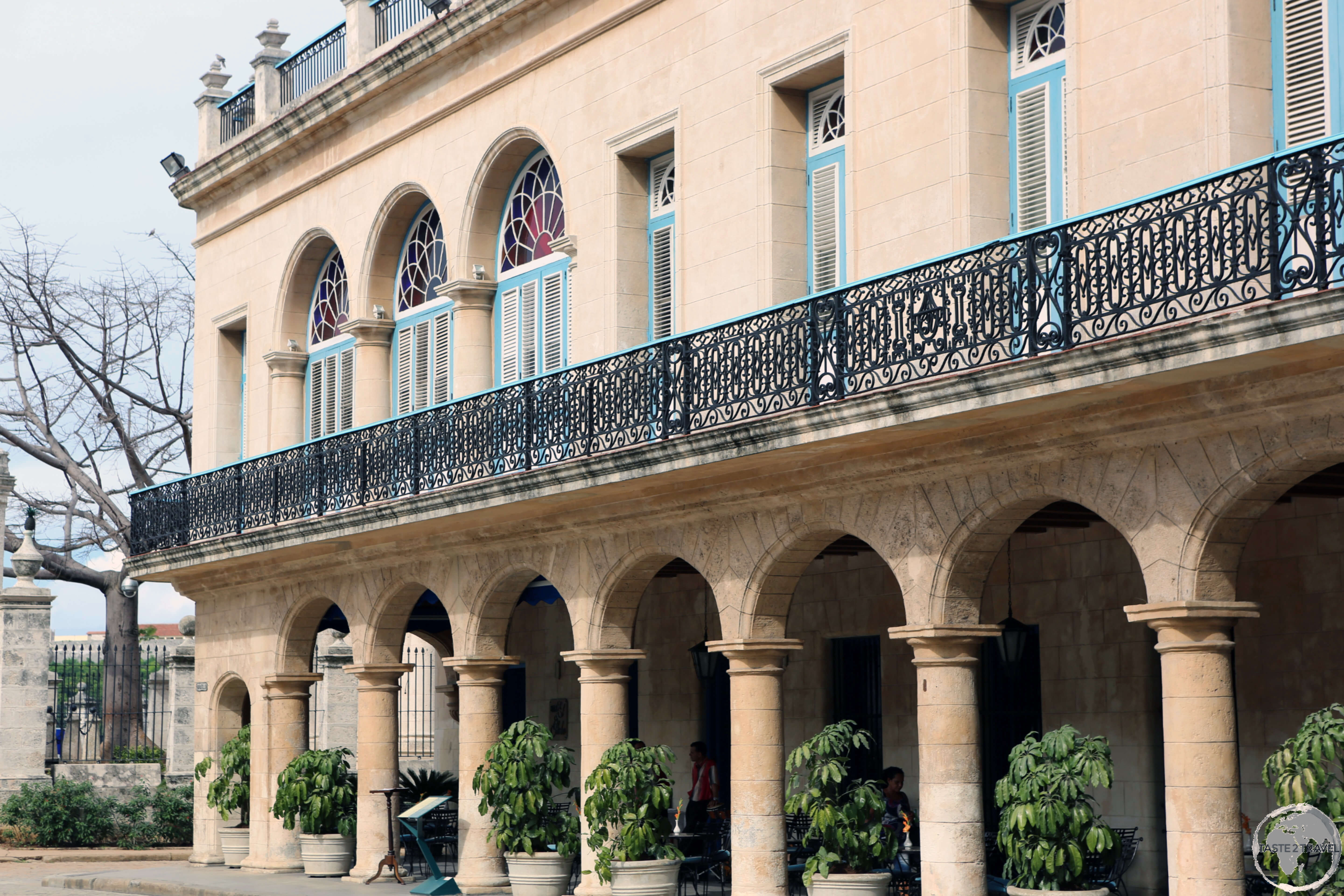 The façade of the historic <i>Hotel Santa Isabel</i> which lies on the Plaza des Armas in the heart of Havana old town. 