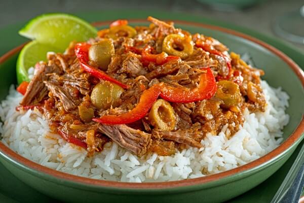 Ropa Vieja (old clothes) is a popular dish in Cuba.