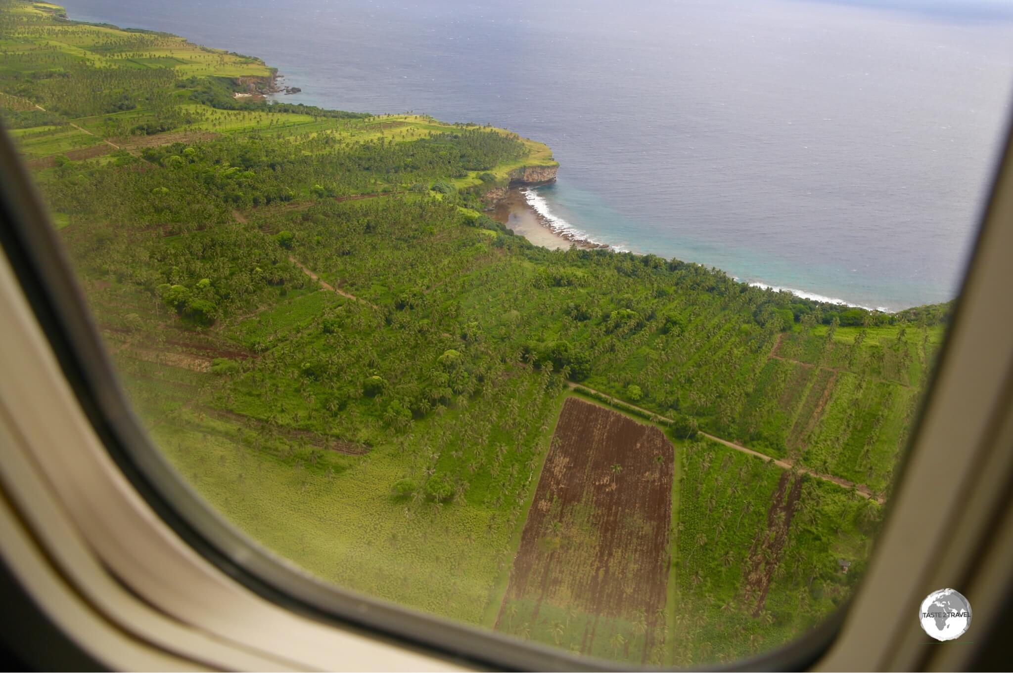 On approach to Fua'amotu International Airport with a view of the south coast of Tongatapu.