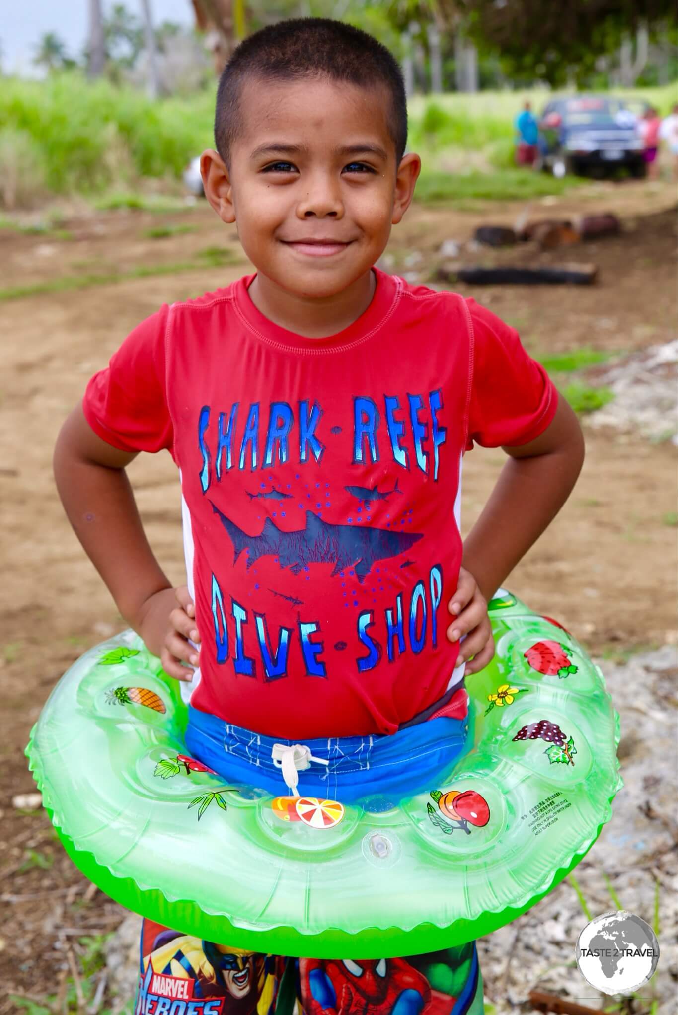 A young boy ready for a swim on the south coast of Tongatapu.