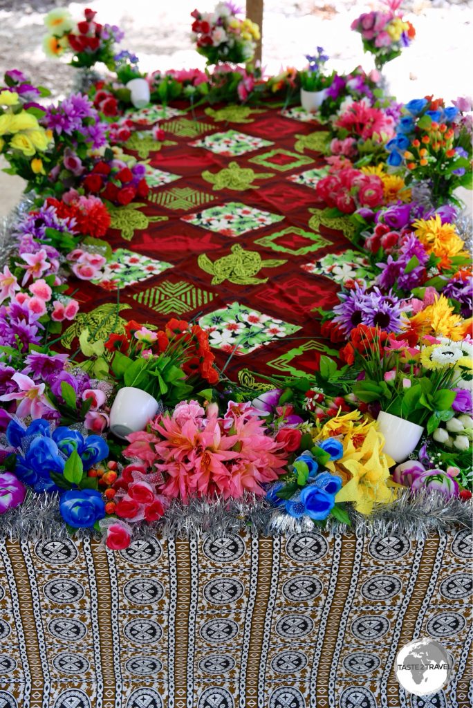 A colourfully decorated grave.