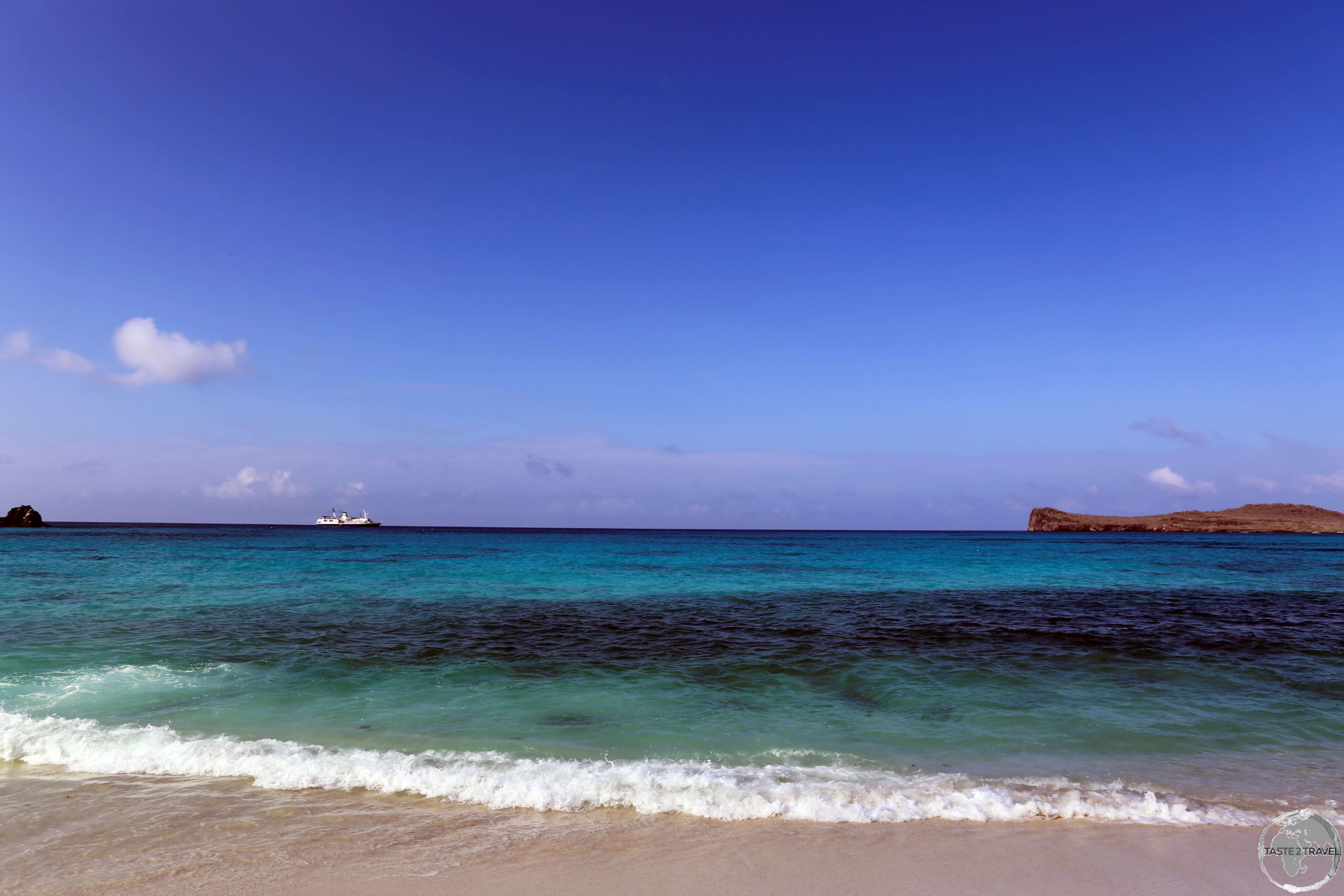 A view of the MV Santa Cruz from Gardener Bay, Española Island.