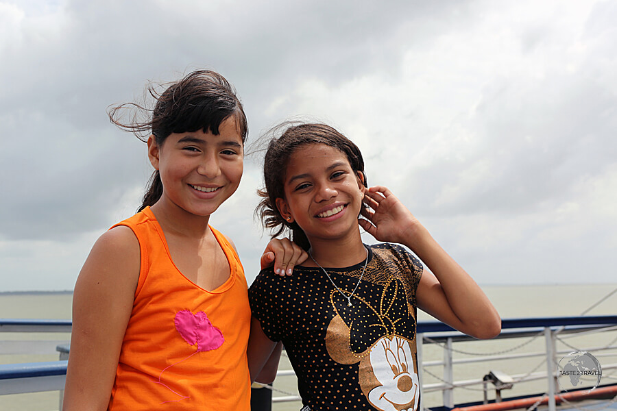 Two fellow passengers, who loved posing for my camera, on the boat from Belém to Macapá.