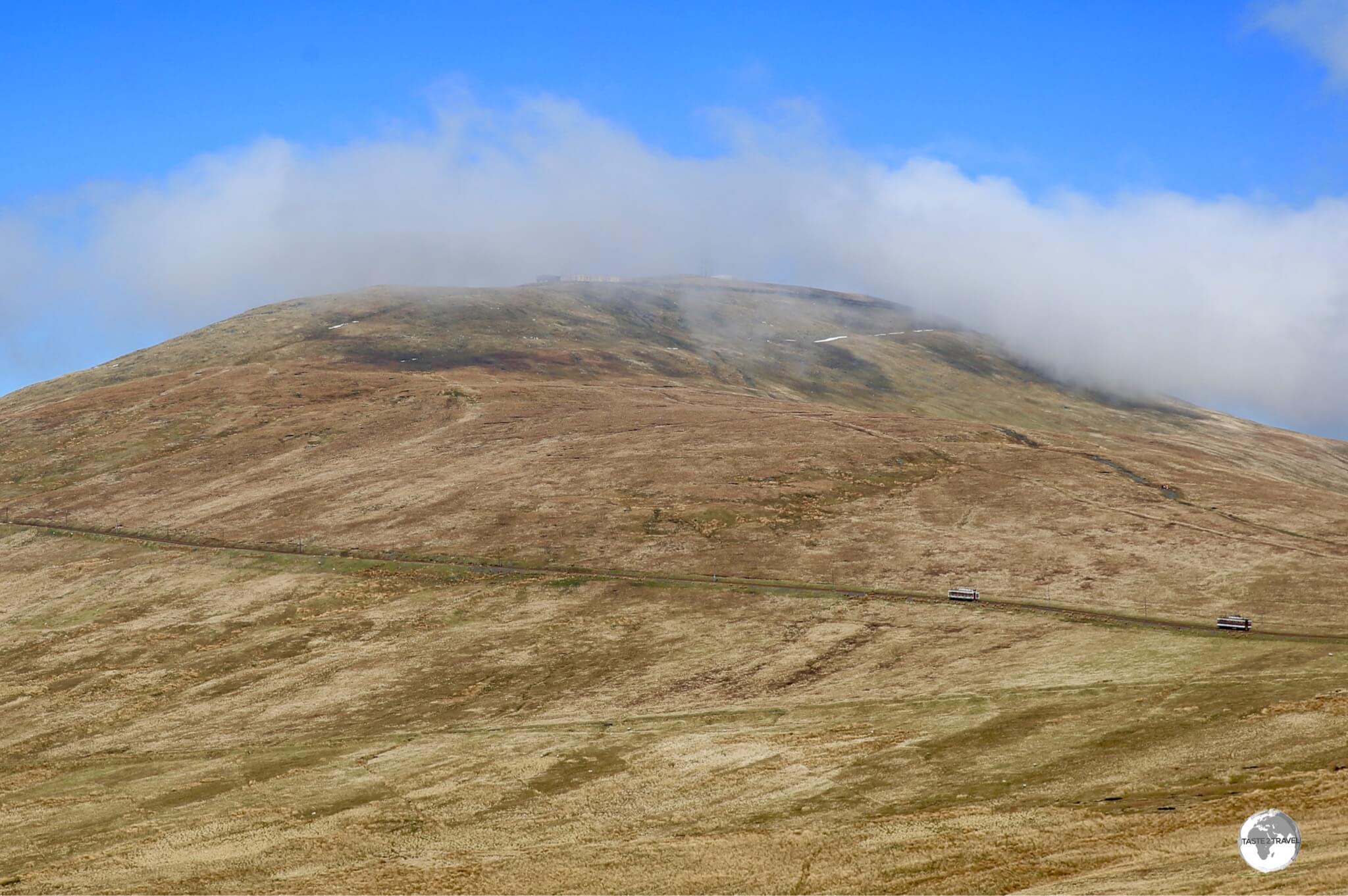 A view of Mt. Snaefell from the main road. Trains can be seen climbing to the summit. 