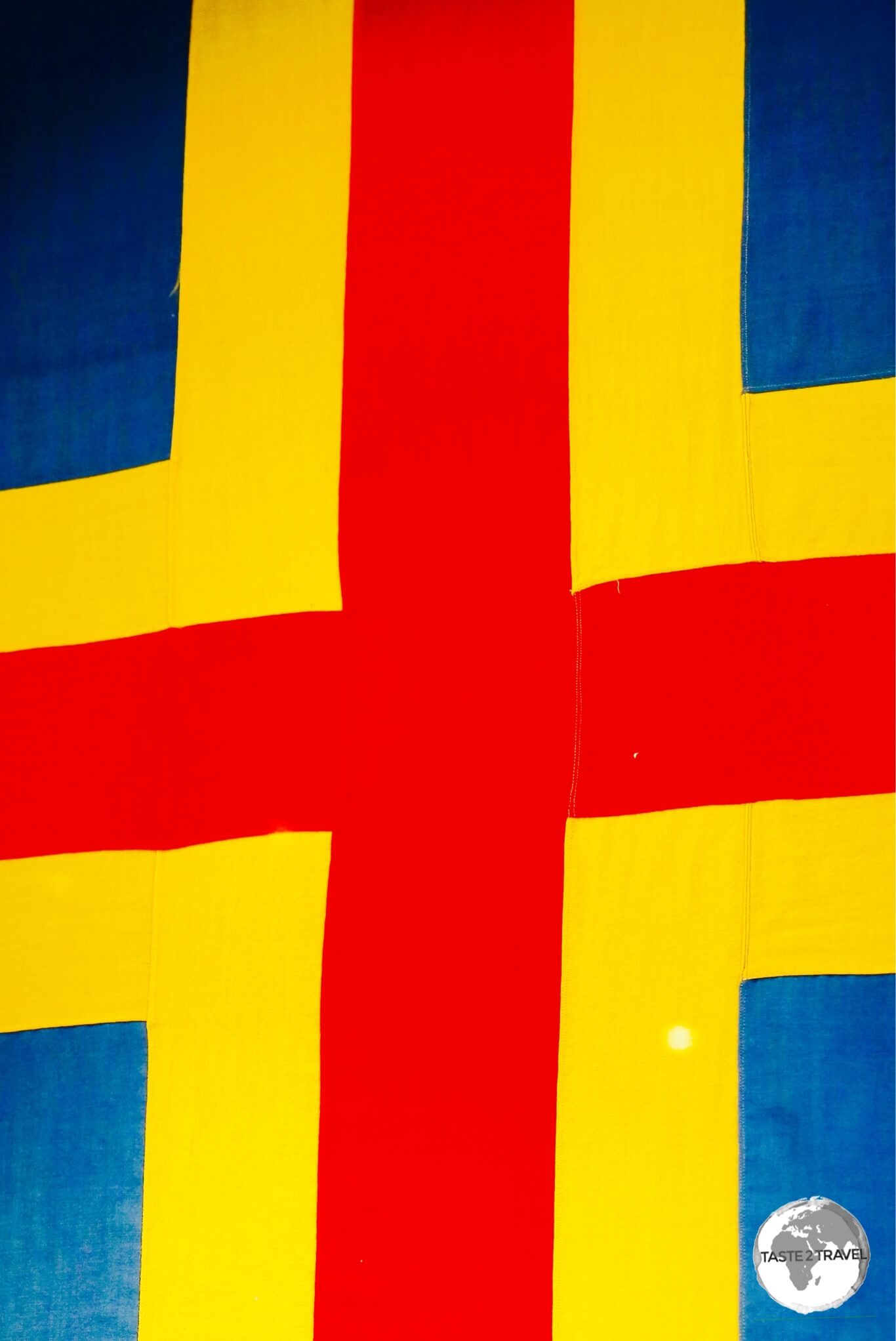 The flag of the Åland Islands is a Swedish flag over-layed with a red cross.