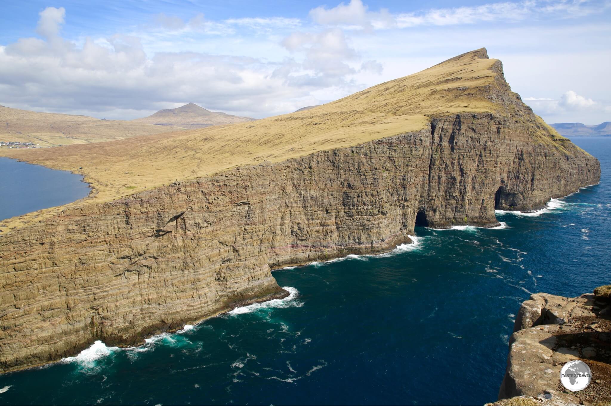 The precipitous cliffs of Ritubergsnøva soar a staggering 376 metres from the Atlantic. 