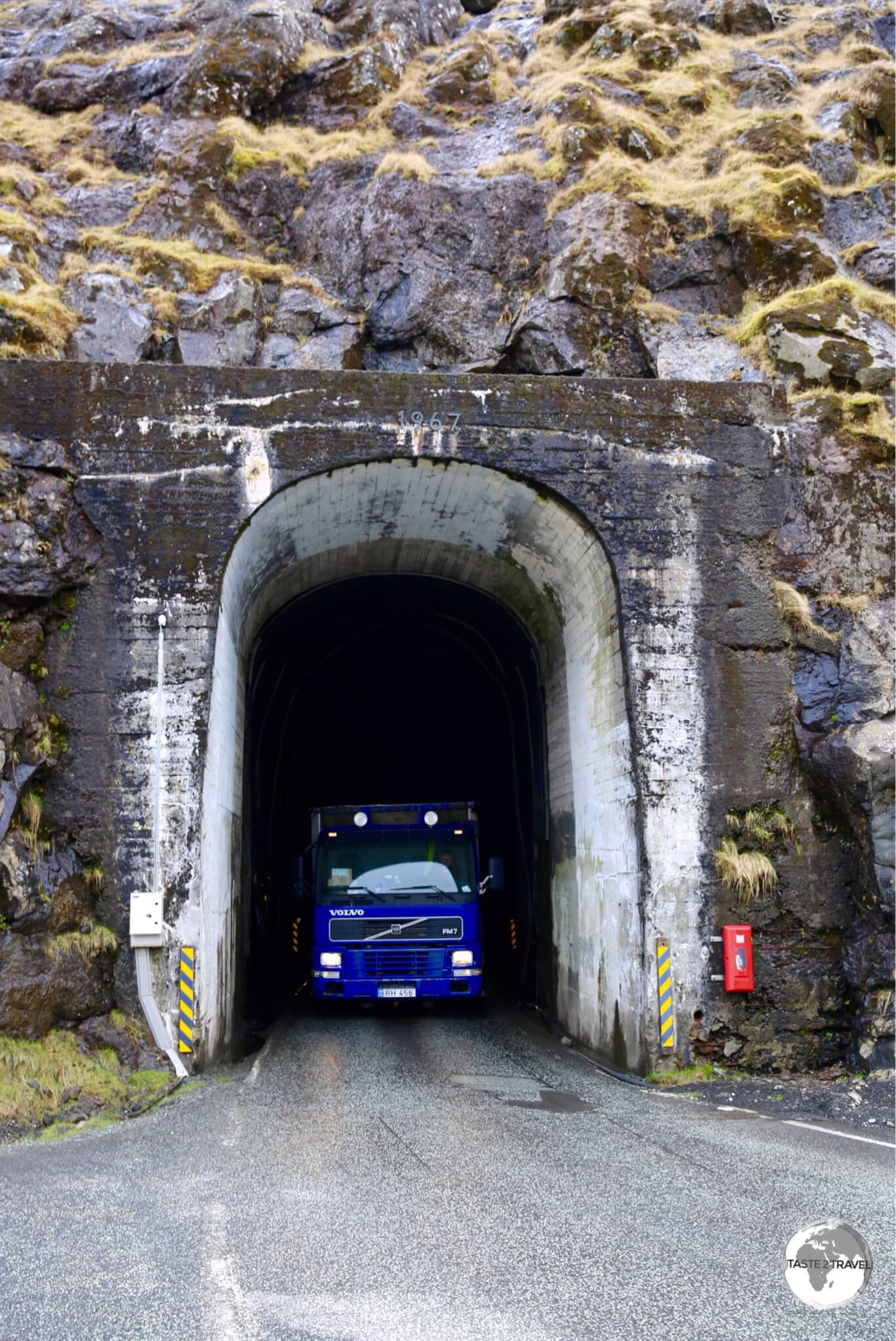 Me yielding (who wouldn't?) to an approaching truck, at the entrance of the 2-km long Hvannasundstunnilin (Hvannasund Tunnel) close to Norðdepil on the island of Borðoy.