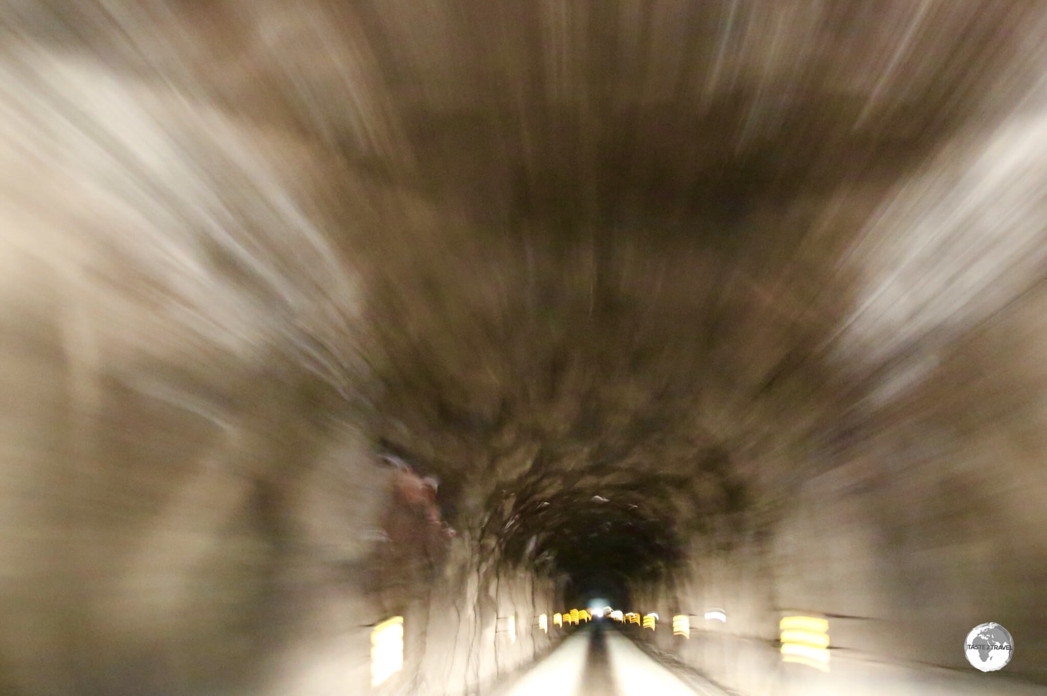 Driving through the 2.2 km long Hvannasundstunnilin (Hvannasund Tunnel) on Bordoy Island.