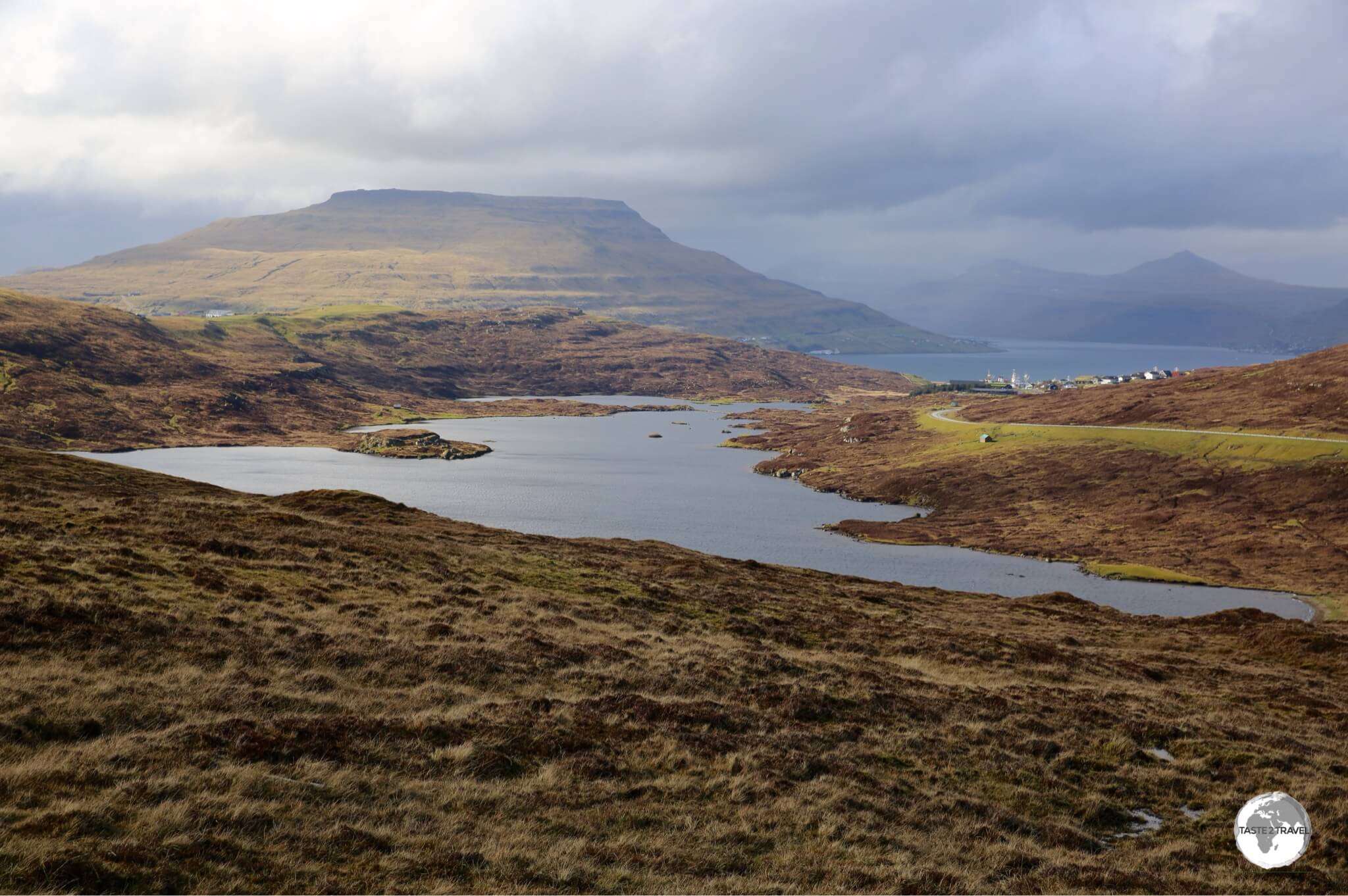 A view of Toftavatn (Lake Toftir), with the town of Runavik in the background.