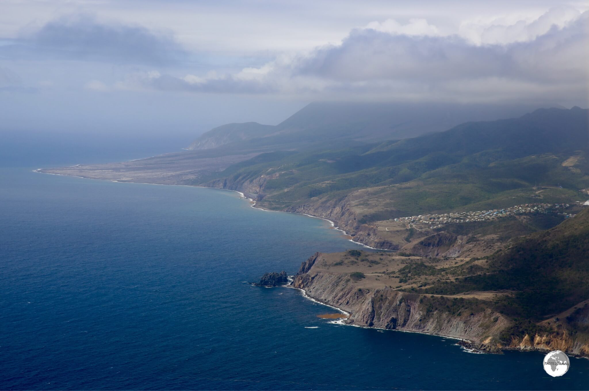 A view of the east coast of Montserrat with recent lava flows visible in the background.