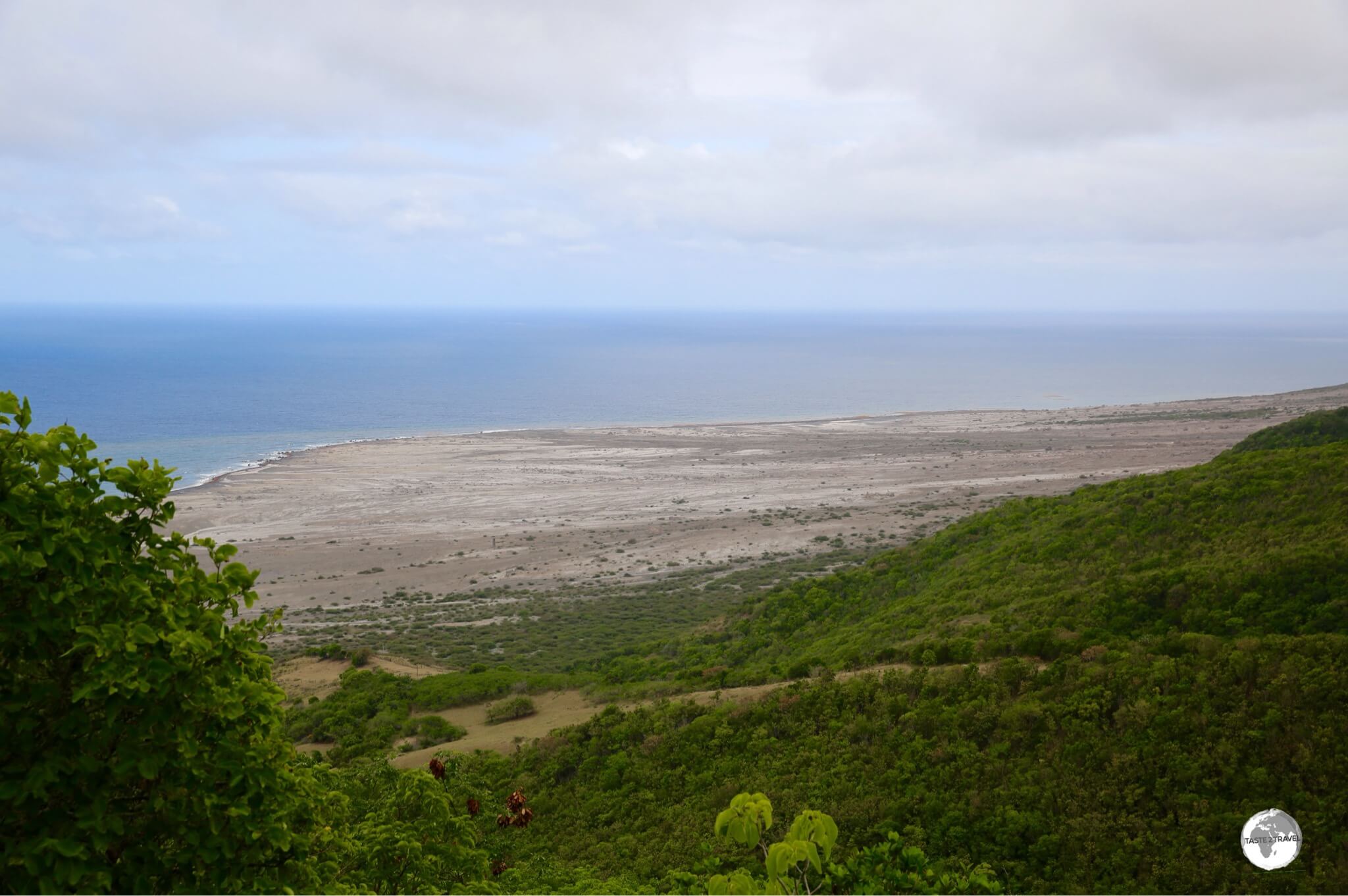 A view into the exclusion zone from the Jack Boy Hill lookout. The old airport, W. H. Bramble, lies buried in the rubble below. 