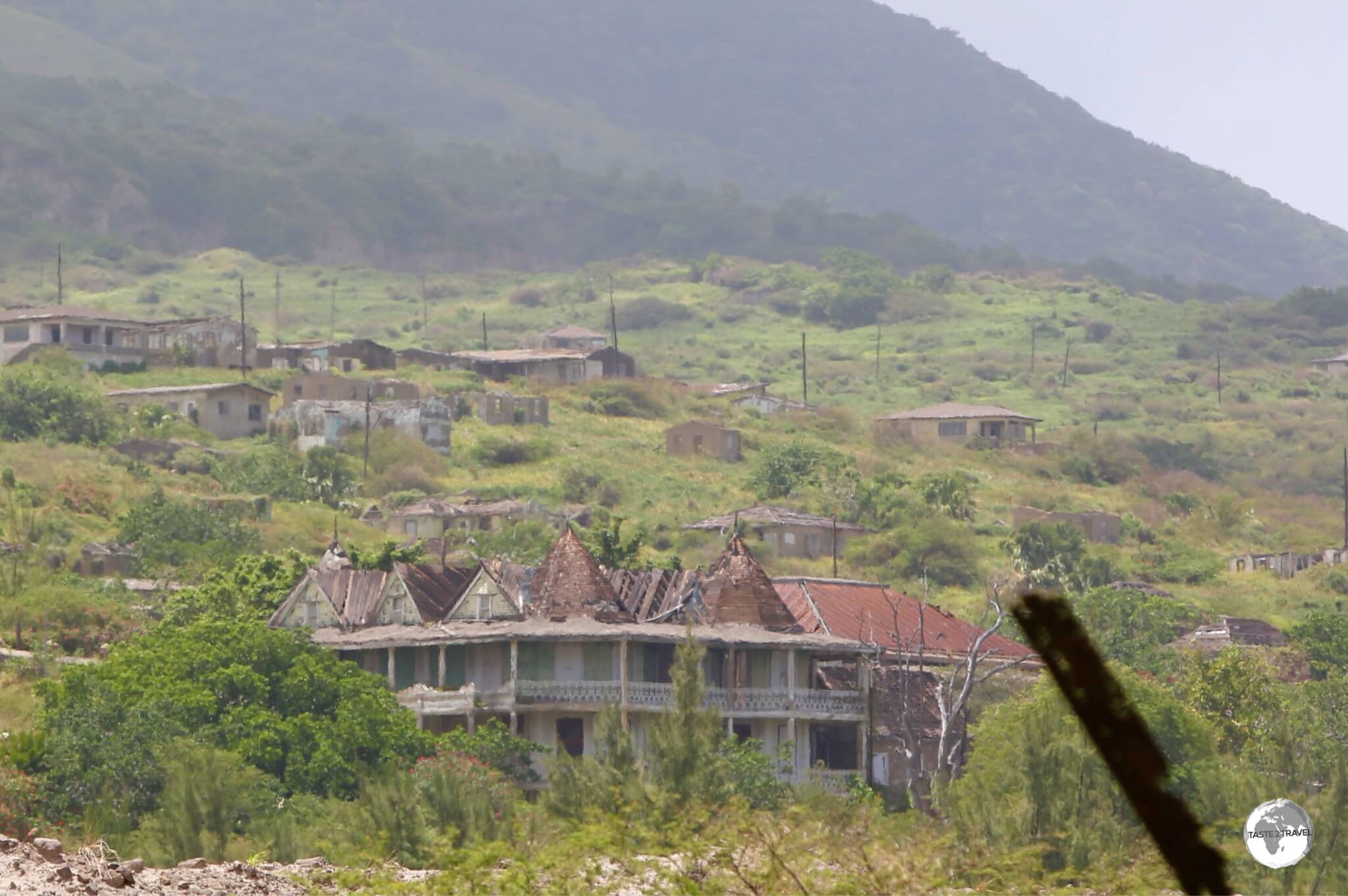 The former Government House in Plymouth lies abandoned, destroyed by pyroclastic flows. 