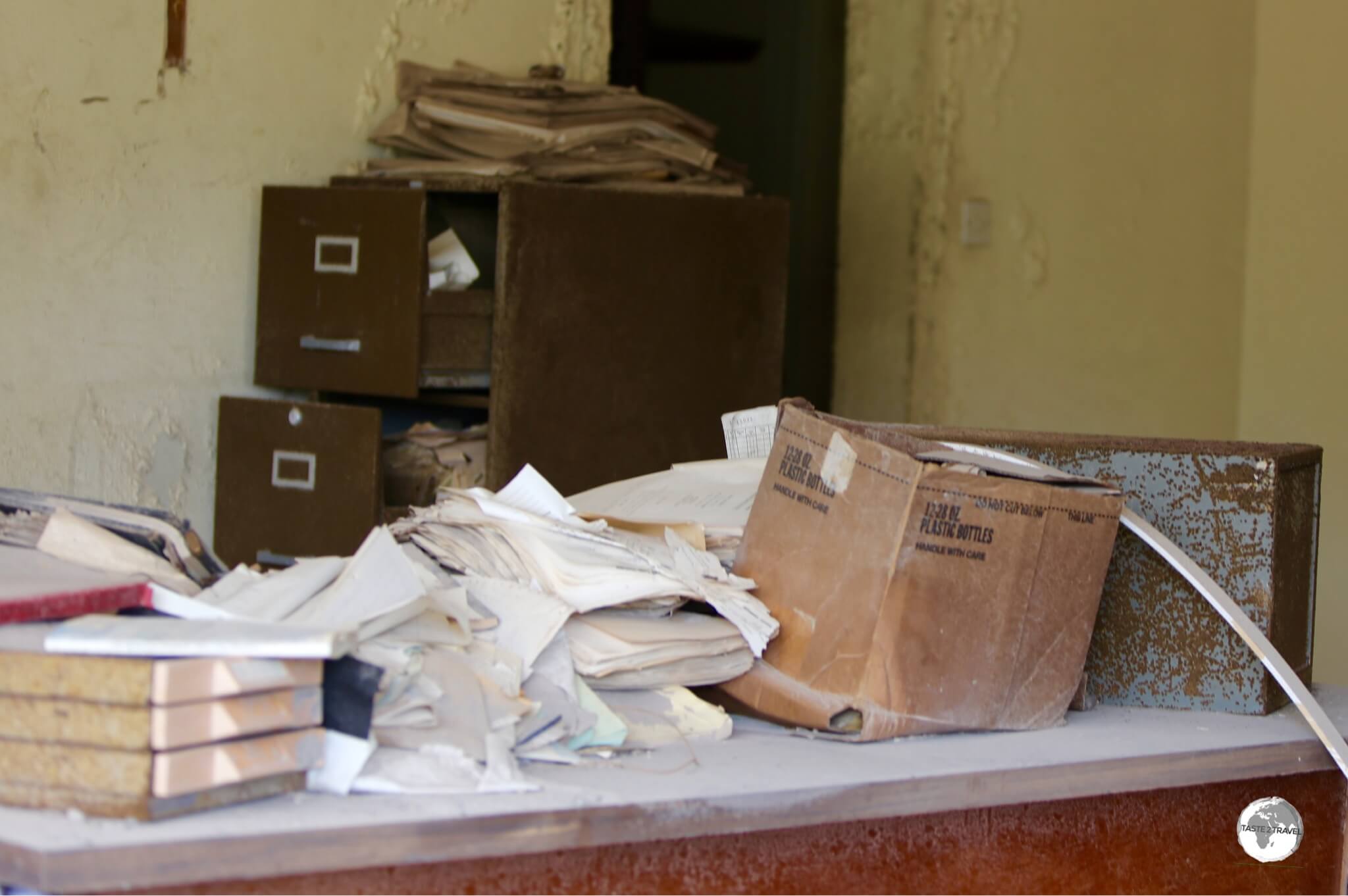 Files and paperwork remain where they were left in an abandoned office in Plymouth.