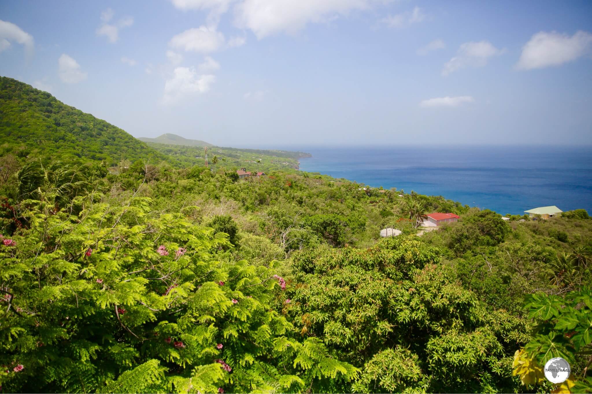 A sweeping view of the lush west coast of Montserrat from the Gingerbread Hill Guest House.