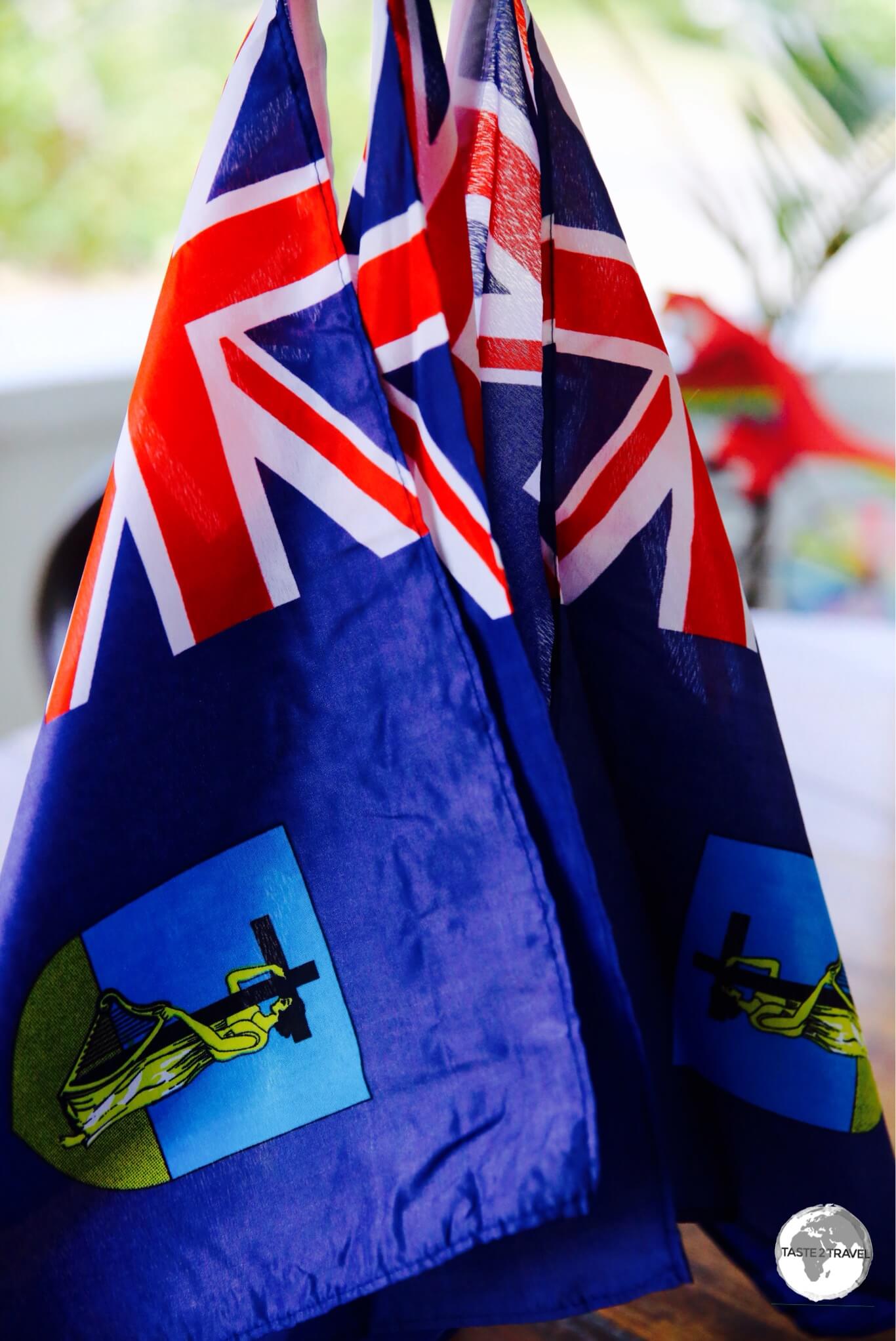 Montserrat souvenir flags on sale at the Hilltop Coffee Shop. 