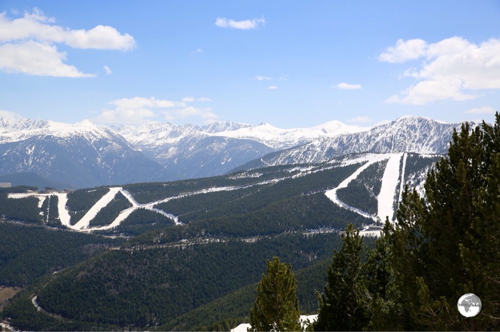 The white ski slopes of the Vallnord resort cut a clear path across the mountain.
