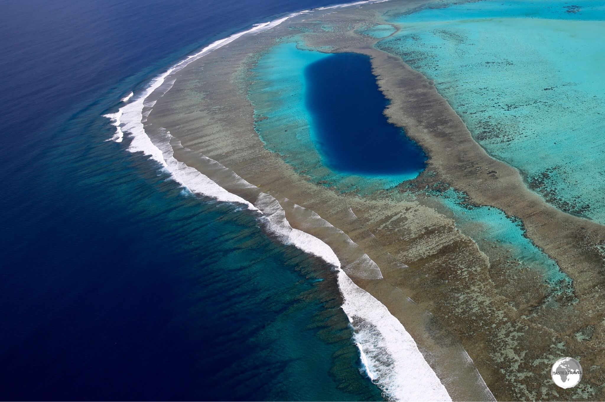 Approaching the Blue Hole, which is protected by its own fringing reef.