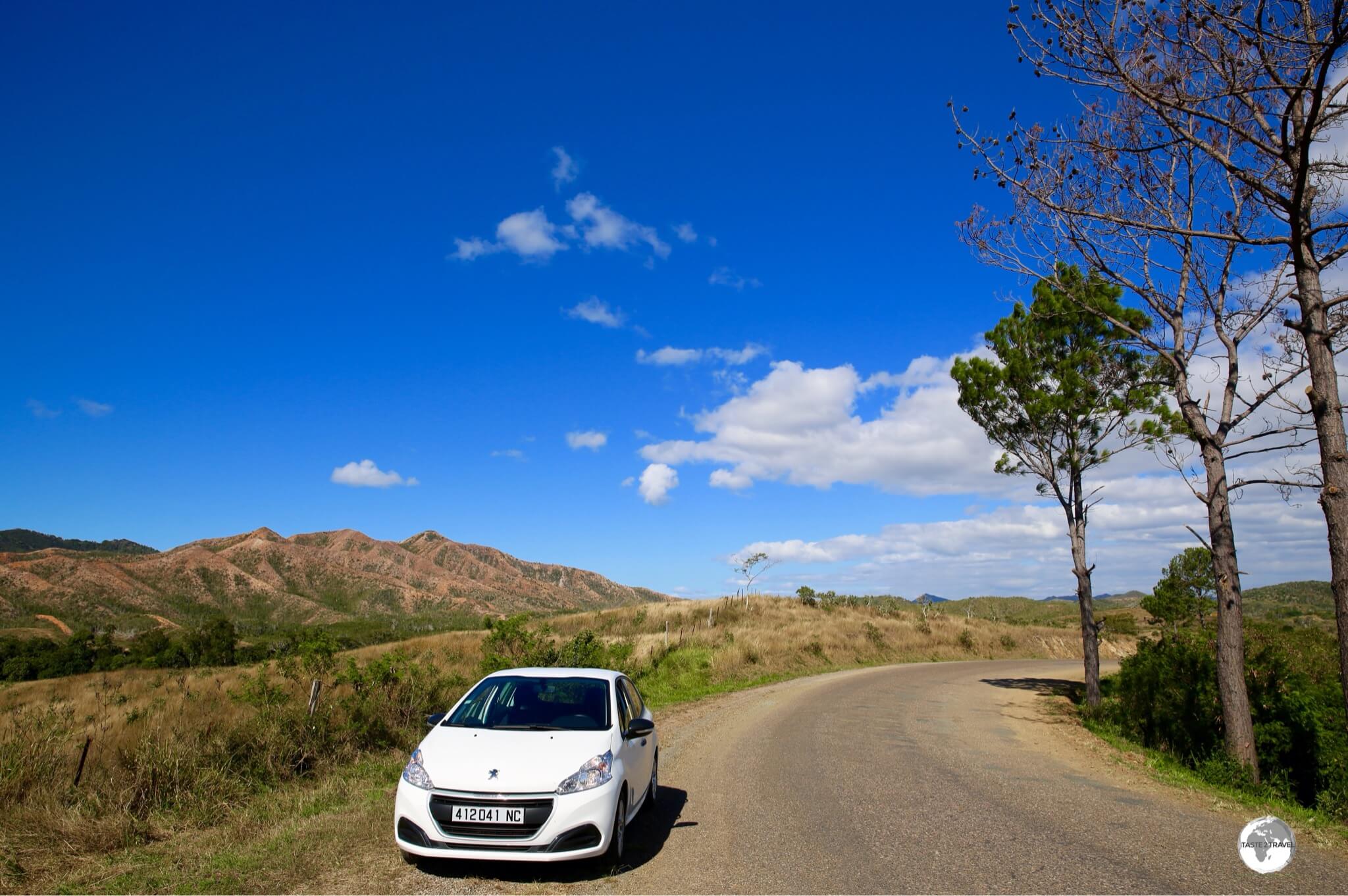 In my rental car on the road to the far northern settlement of Poum.