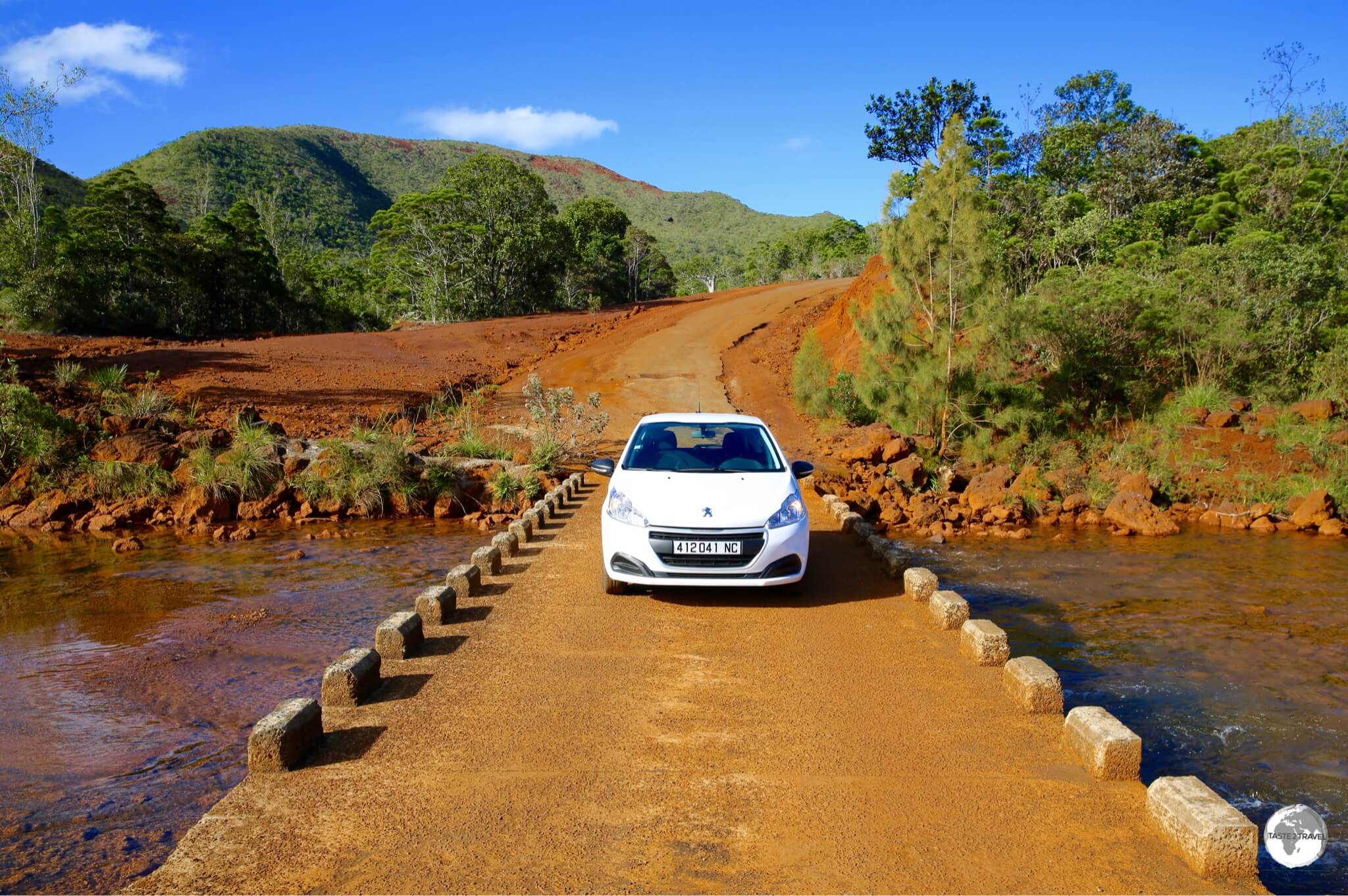 My rental car, crossing a river in a remote corner of Le Grand Sud region.