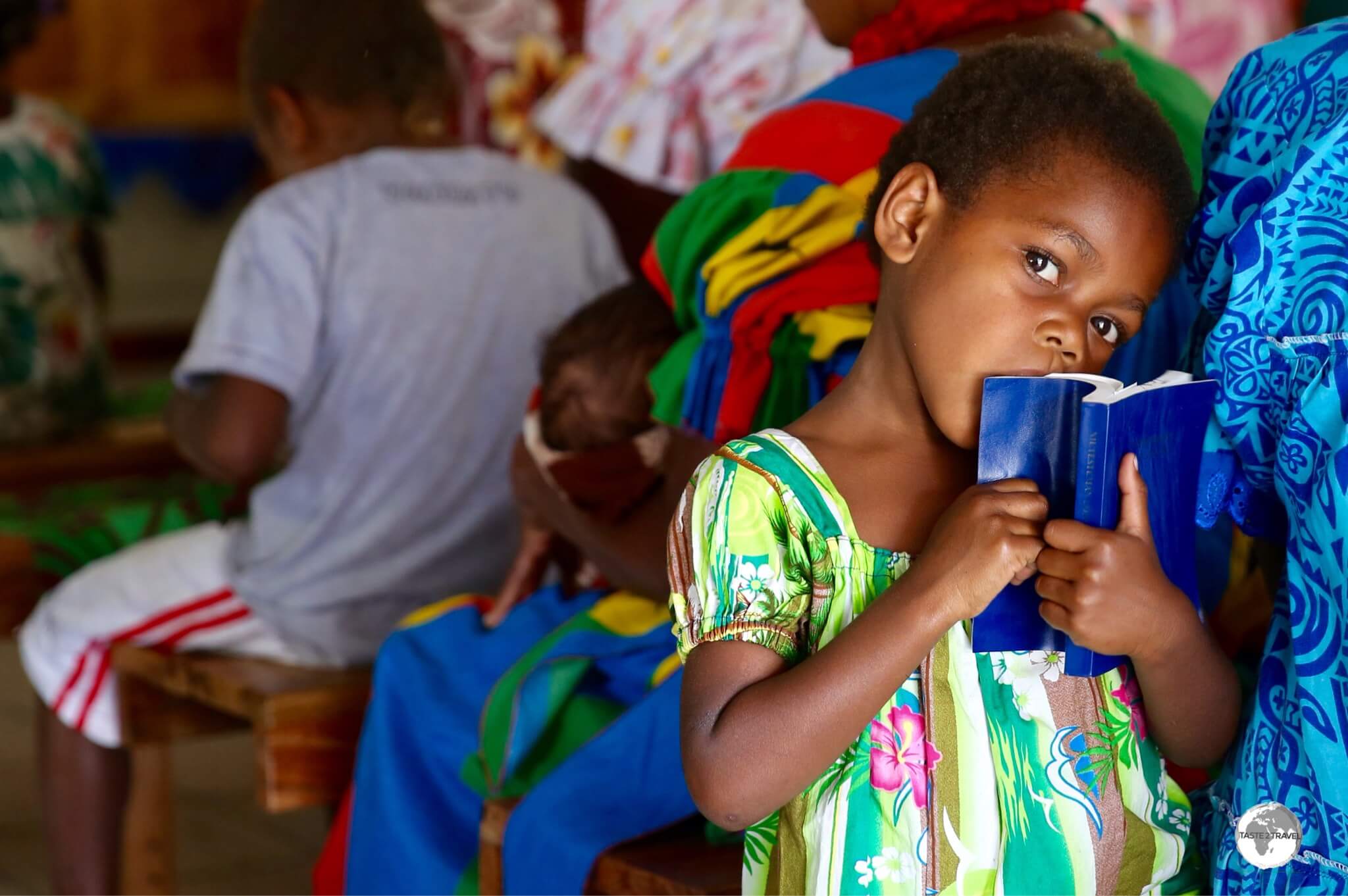 My presence was a novelty for the children of Louna Sunan, who were clearly bored with the church service.