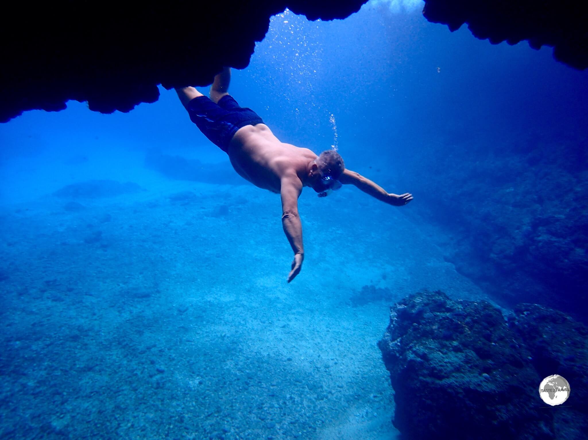 Myself, making a graceful entry into the Blue Cave on Tanna island.