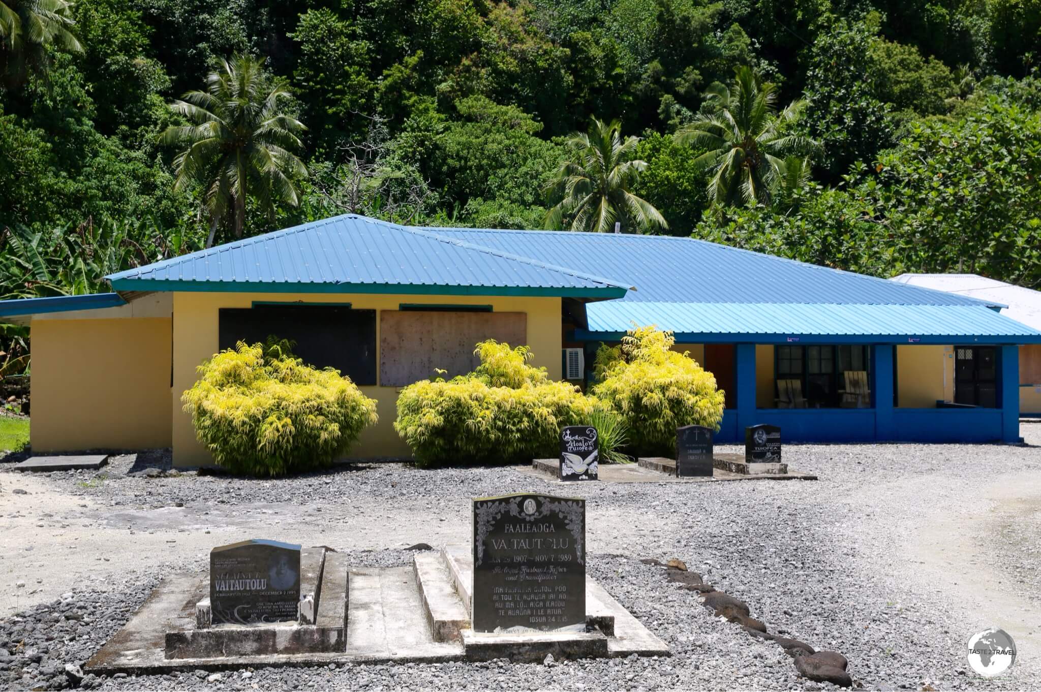 My family homestay on the island of Ta'u. As is customary in Polynesia, deceased relatives are buried in the front garden. 