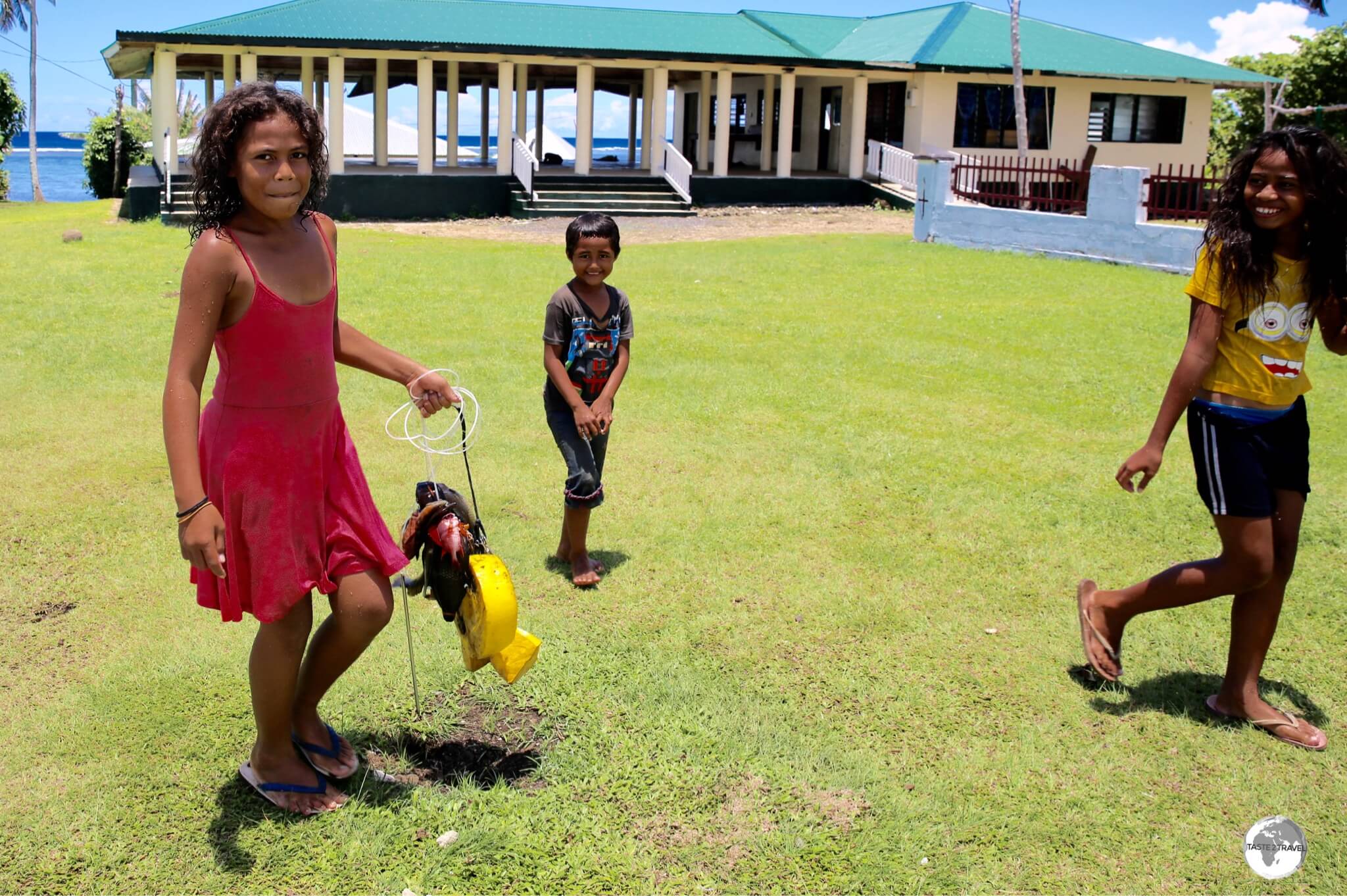 Children in Amaile returning home with the catch of the day.