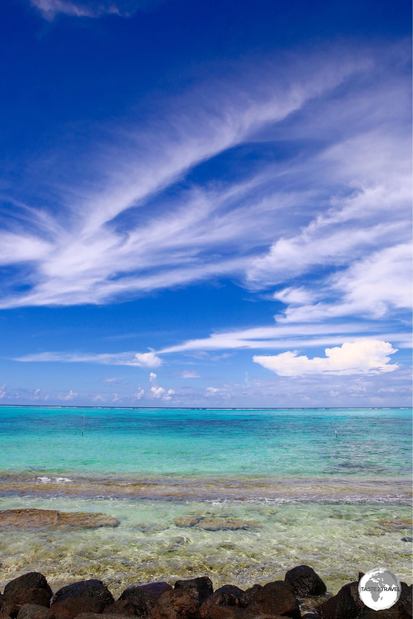 A typical east coast view on Savai'i with lava stones in the foreground.