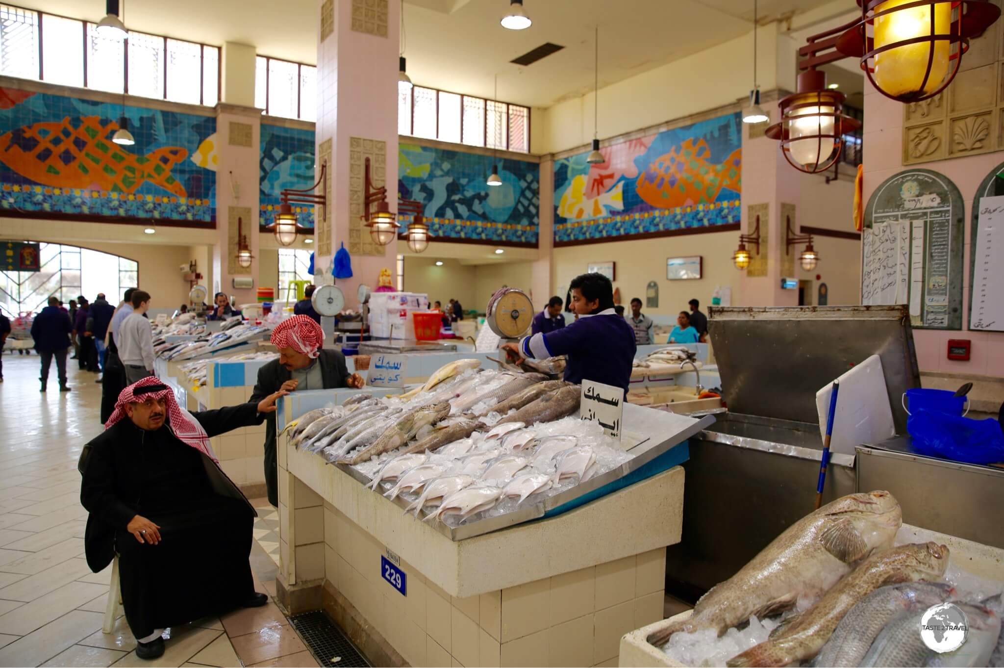 Kuwait Travel Guide: Colourful, marine-themed, mosaics line the walls of the very clean Kuwait fish market.