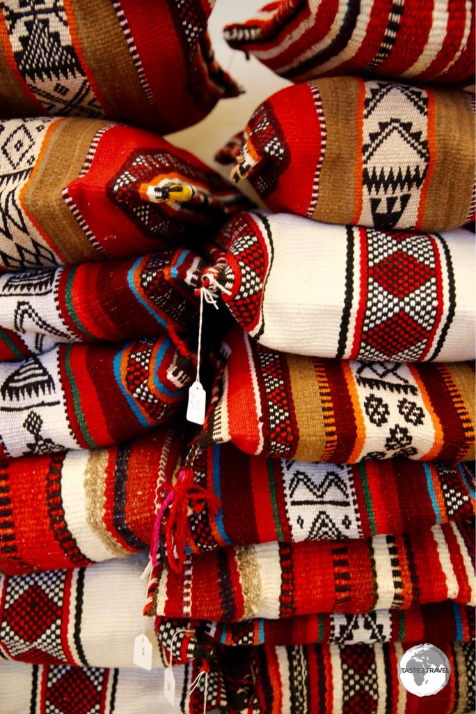 Colourful hand-woven pillow cases at the Al Sadu House gift shop.