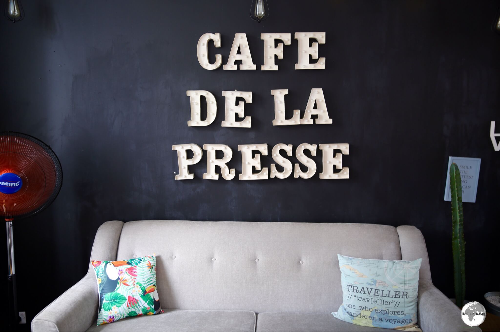 My favourite sofa (with the 'Traveller' cushion) at Cafe De La Presse.