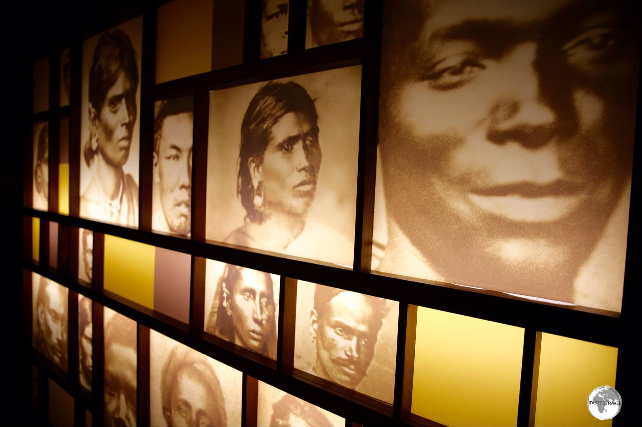 Photos of Indian indentured labourers at the Aapravasi Ghat museum. 