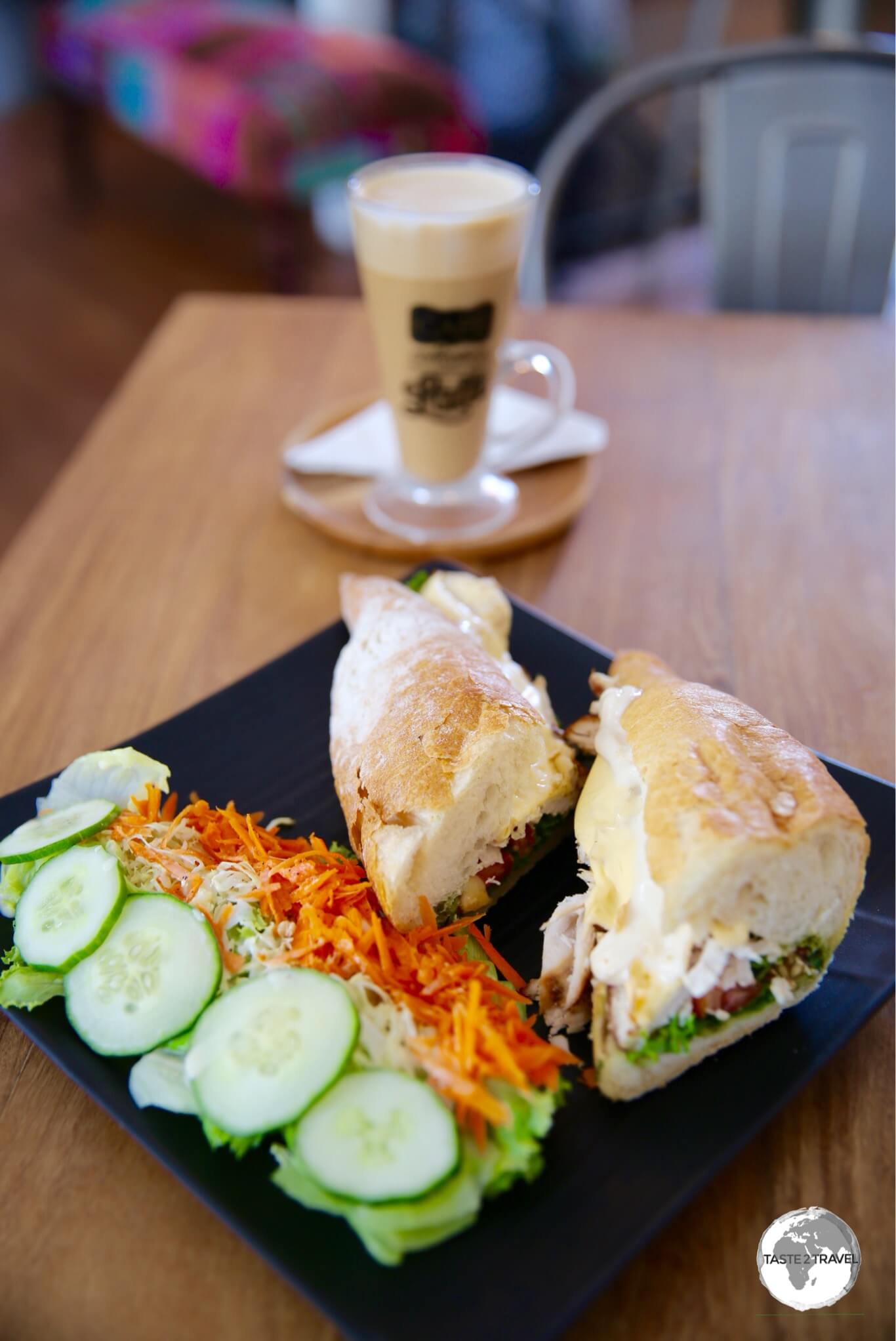 A great lunch at Café de la Presse - a fresh, crusty baguette with chicken and salad served with a robust cafe latte.