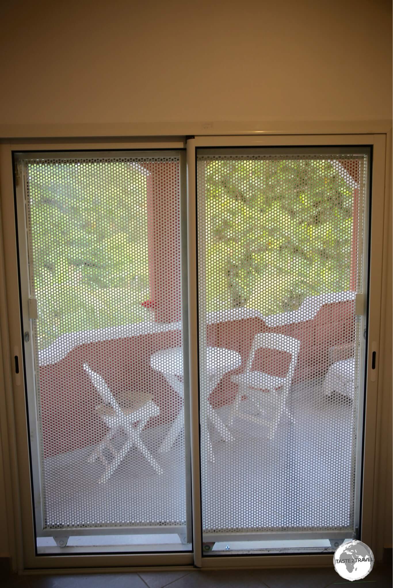 My guest house in the town of Sada. Homes on Mayotte are secured with bars and grill doors to prevent robberies.