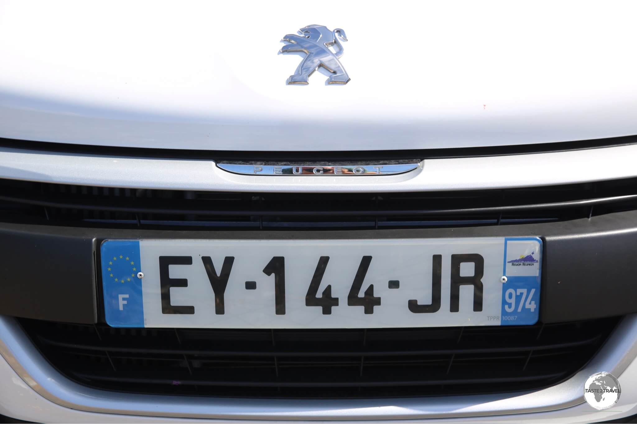 The license plate on my rental car with the <i>974</i> French department number of Réunion.