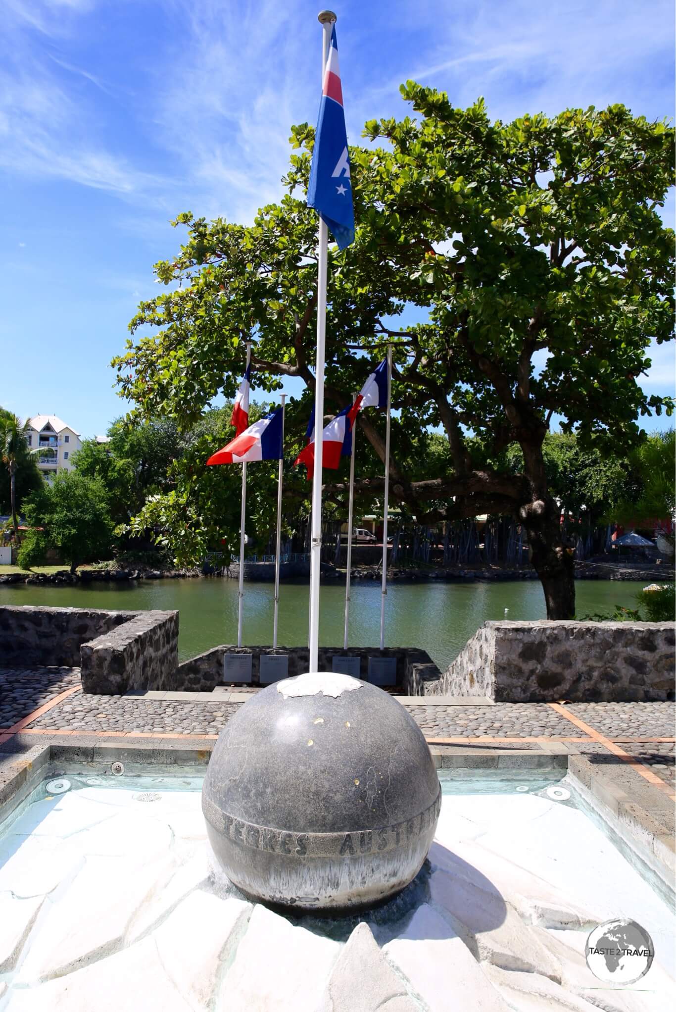 A monument at the TAAF information centre in St. Pierre shows the location of the Antarctic territories on a globe.