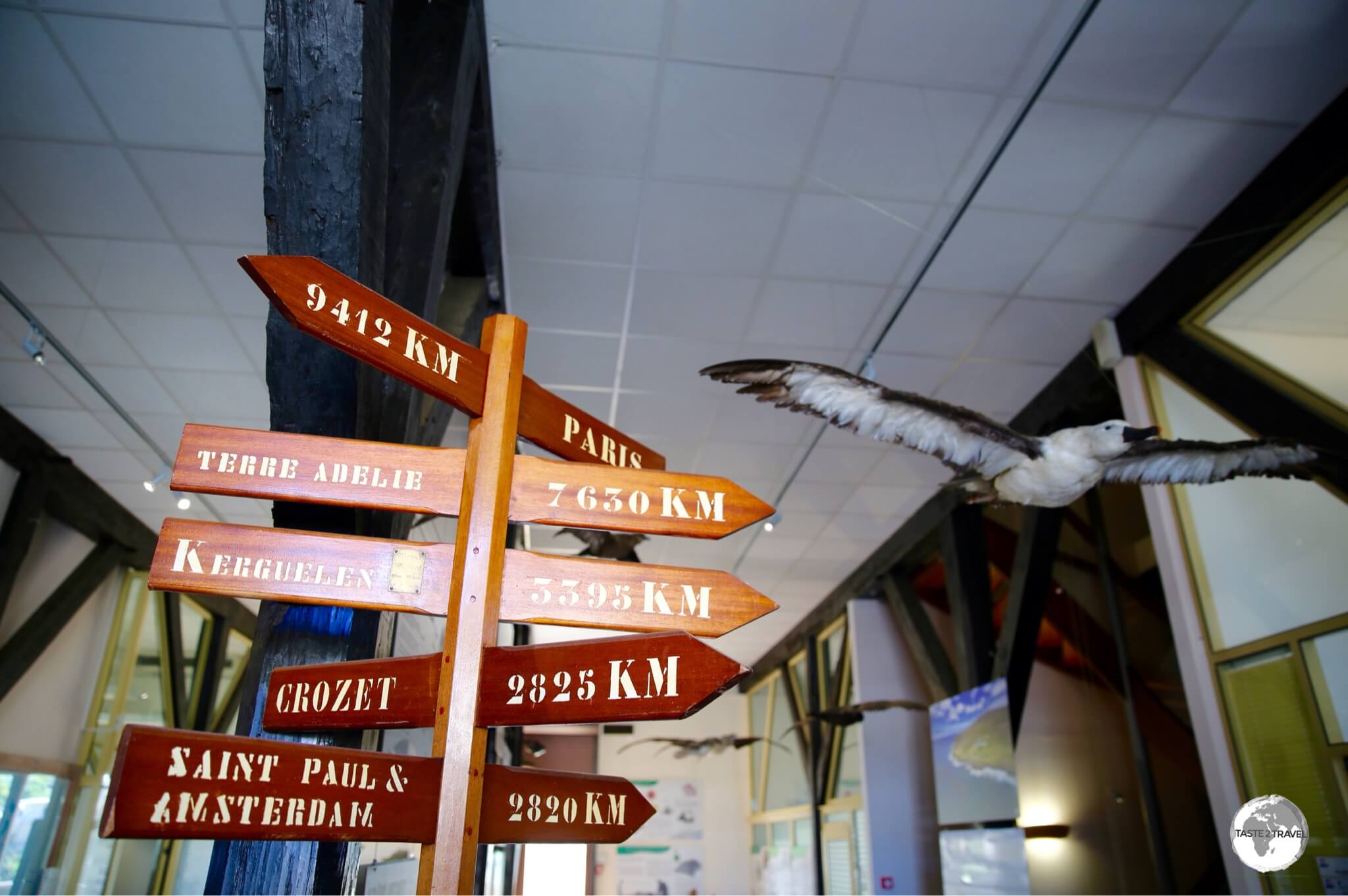 A marker inside the TAAF Information centre indicates distances to the various French Antarctic islands from St. Pierre.