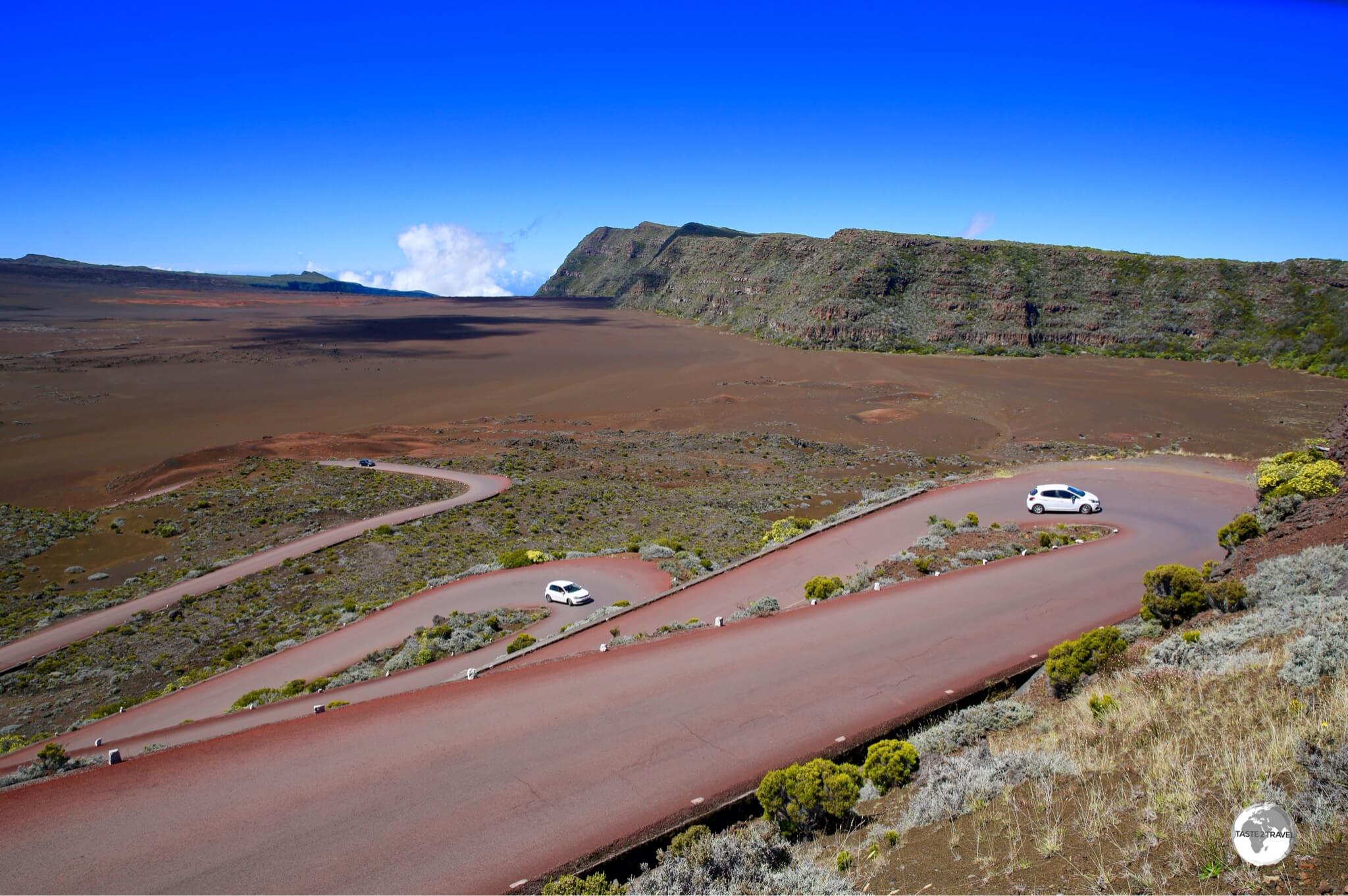 The road to the Piton de la Fournaise descends onto the <i>Plaine de Sables</i>.