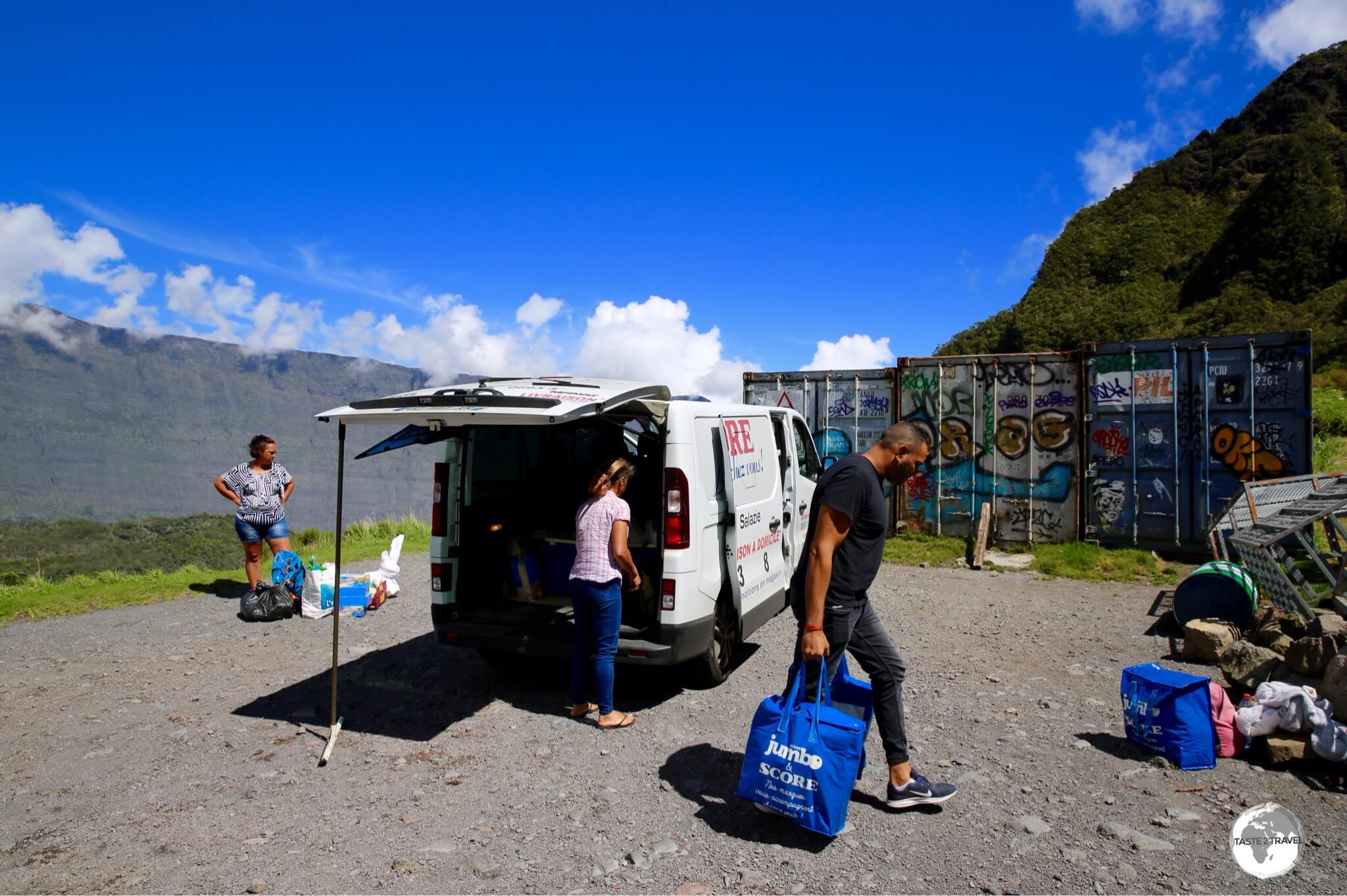 A local supermarket provides grocery delivery for the residents of La Nouvelle with perishable items being stored in refrigerated containers until they are collected.