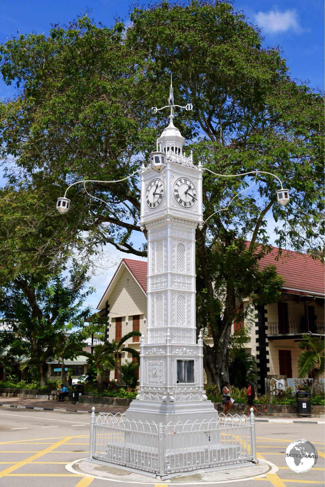 A busy roundabout, the clock tower stands at the centre of the capital Victoria.