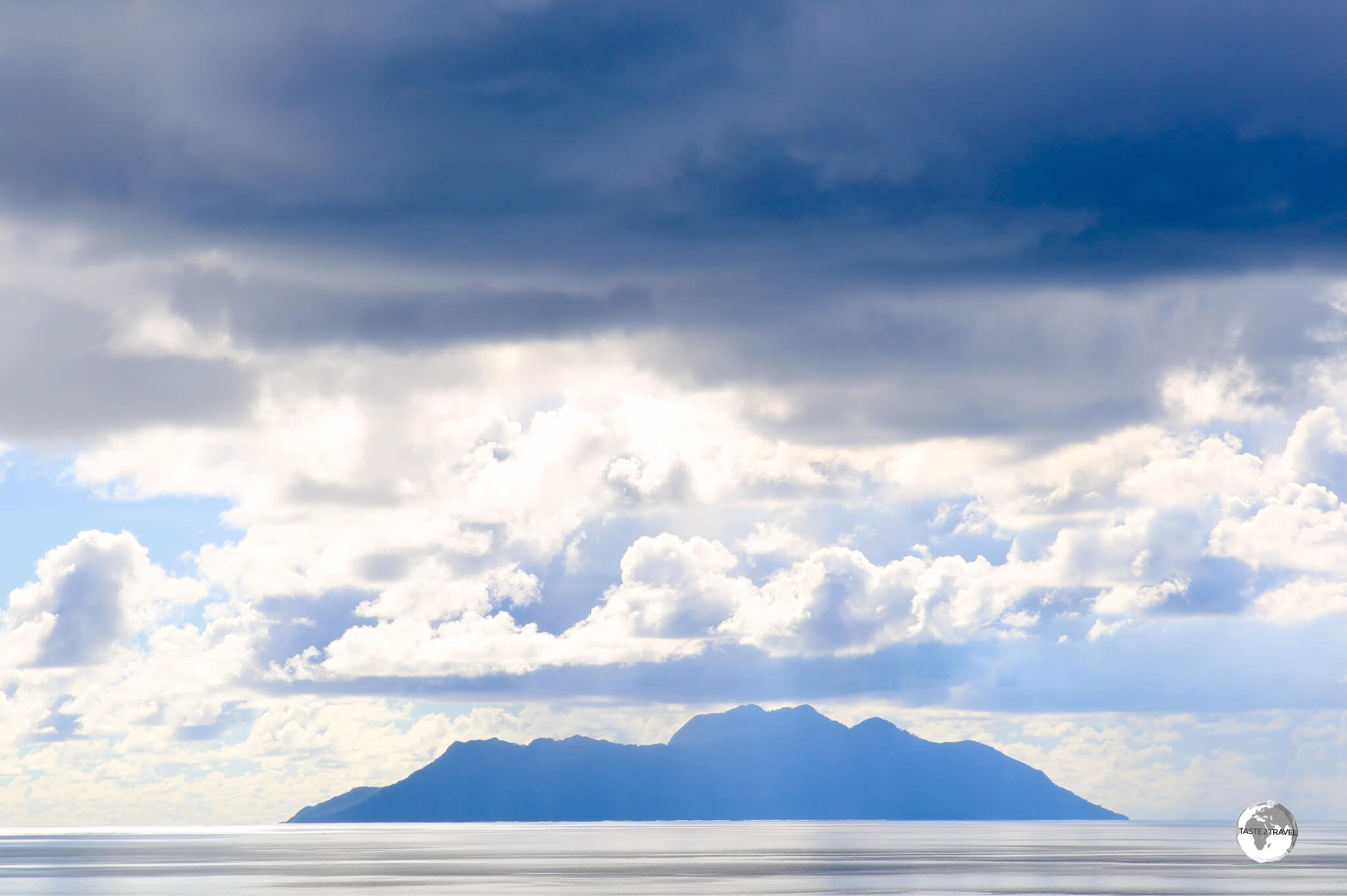 The silhouette of Silhouette island, as seen from Beau Vallon beach. 