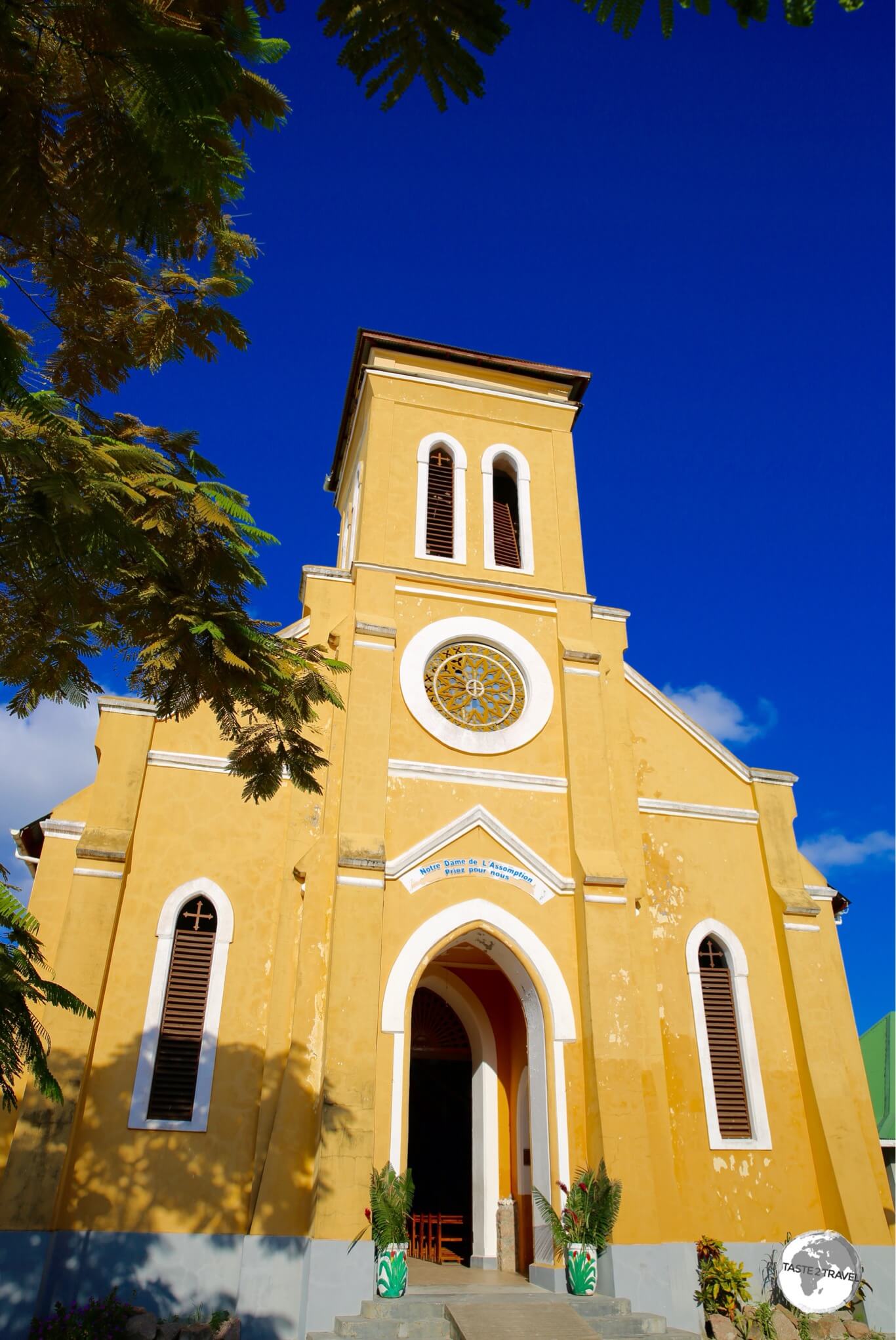 Impossible to miss, the bright-yellow Notre Dame de L’Assomption Church dominates the waterfront on La Digue Island. 