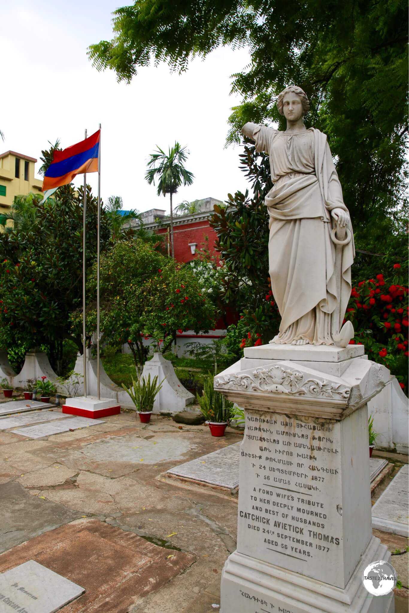 The gravestone of Catachik Avatik Thomas includes a statue of his wife.