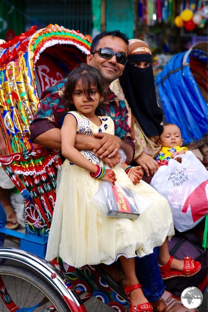 Plenty of room for an entire family on a bicycle rickshaw.