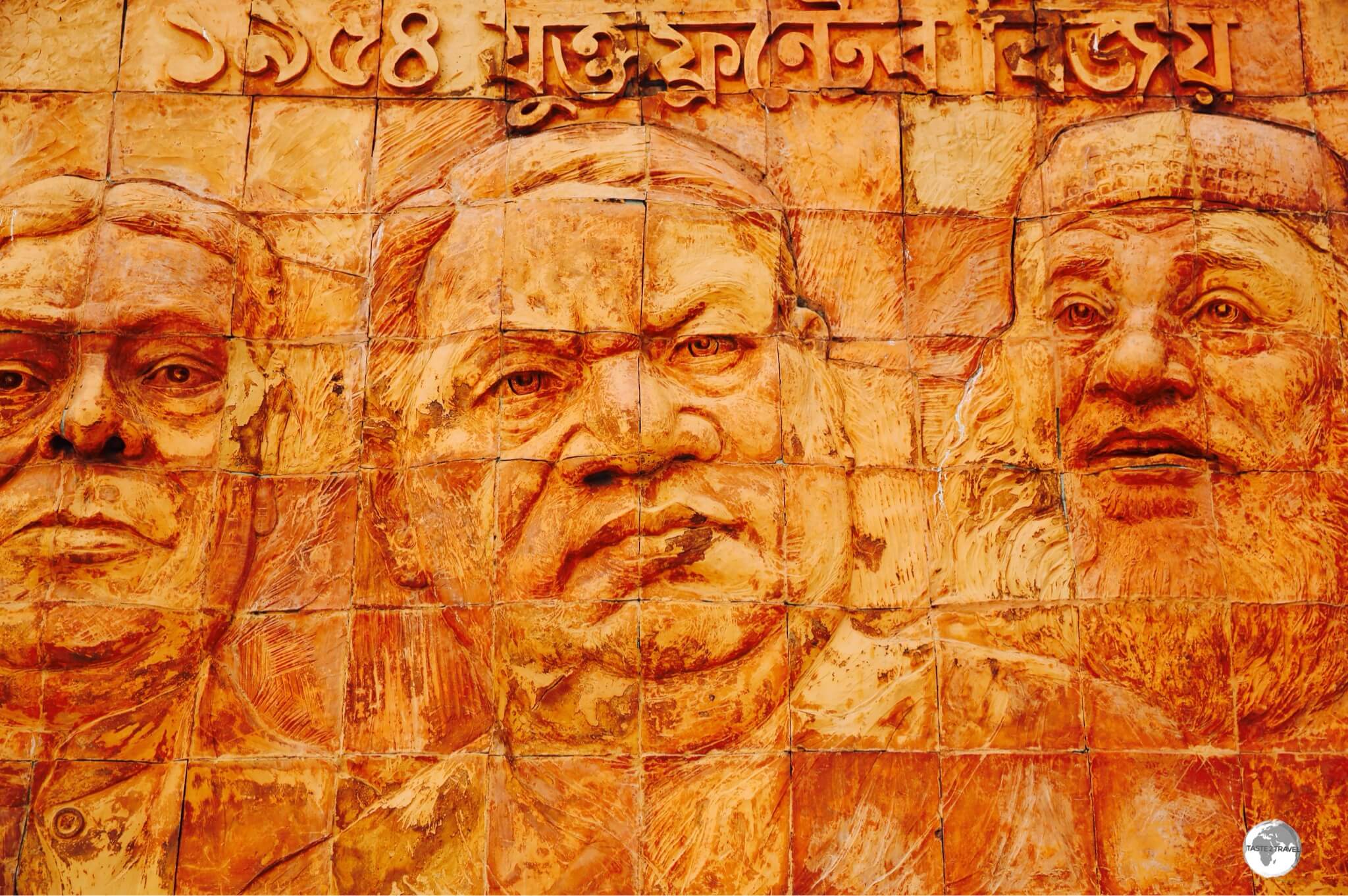 Terracotta panels at the entrance to the Museum of Independence feature heroes from the War of Liberation.